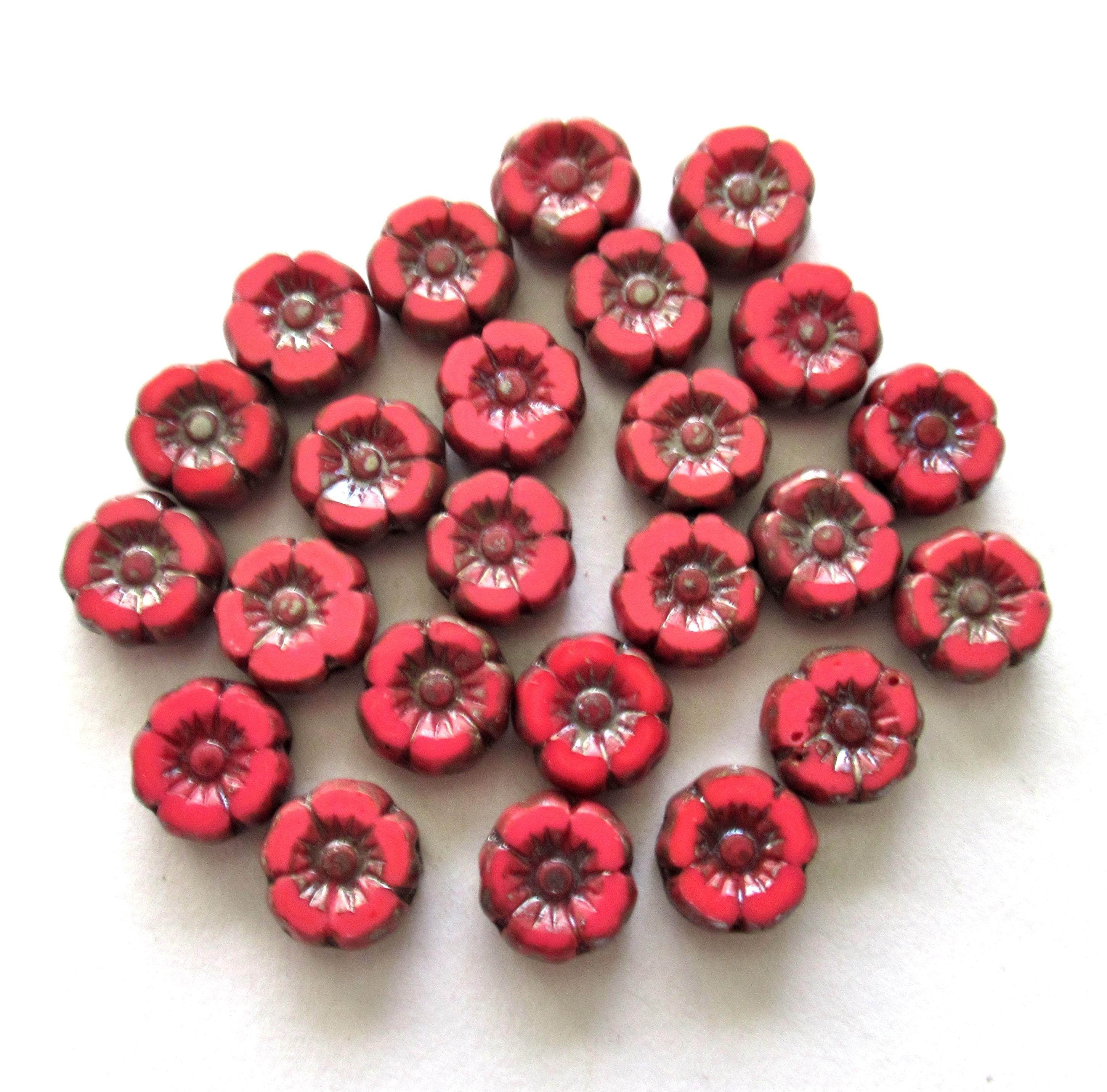Twelve small 7mm Czech glass flower beads - opaque coral red w/ picasso accents - table cut carved Hawaiian hibiscus flower beads C00051