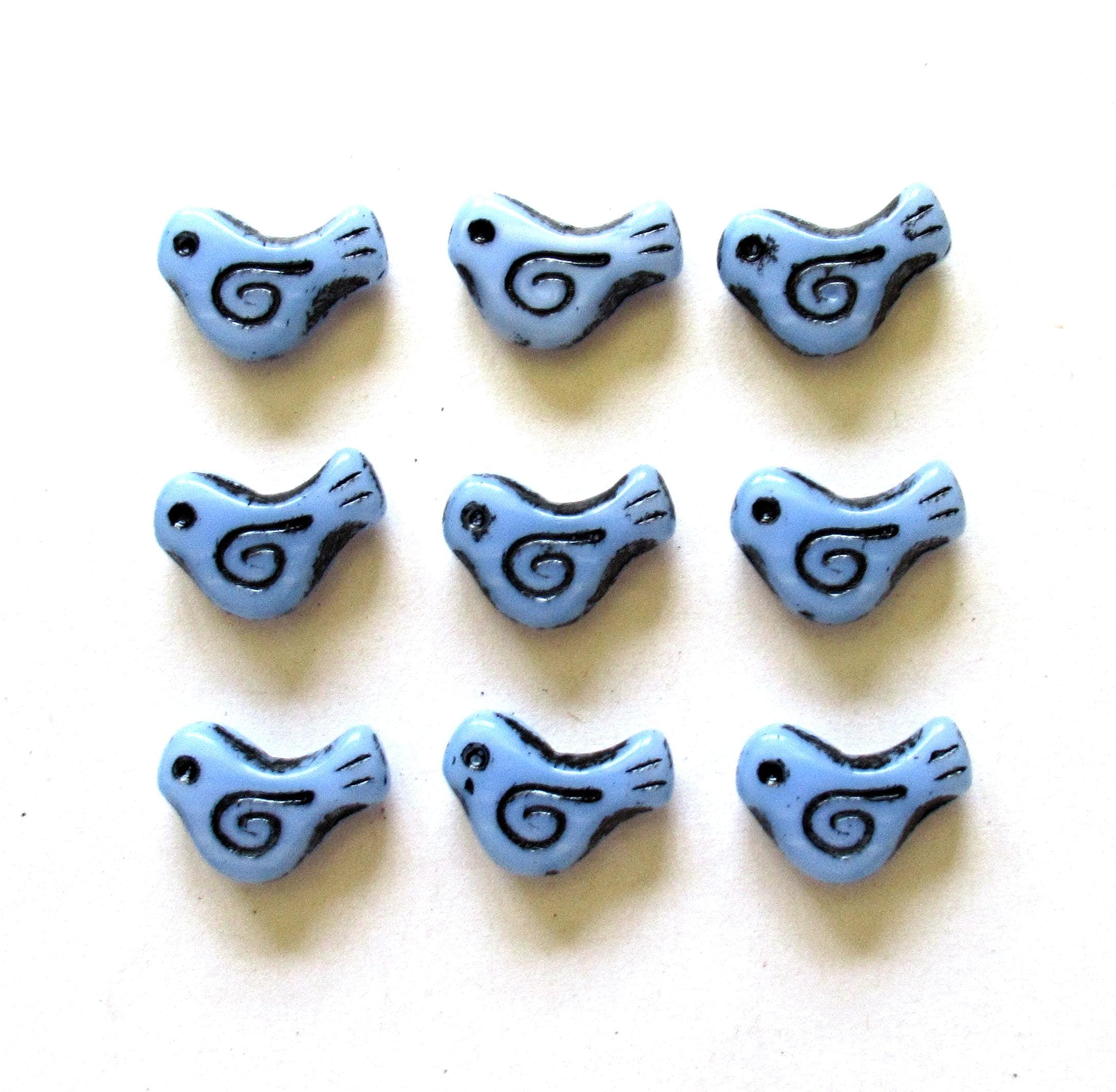 8 Czech glass bird beads - 12 x 16mm - opaque light blue with a black wash - C0621