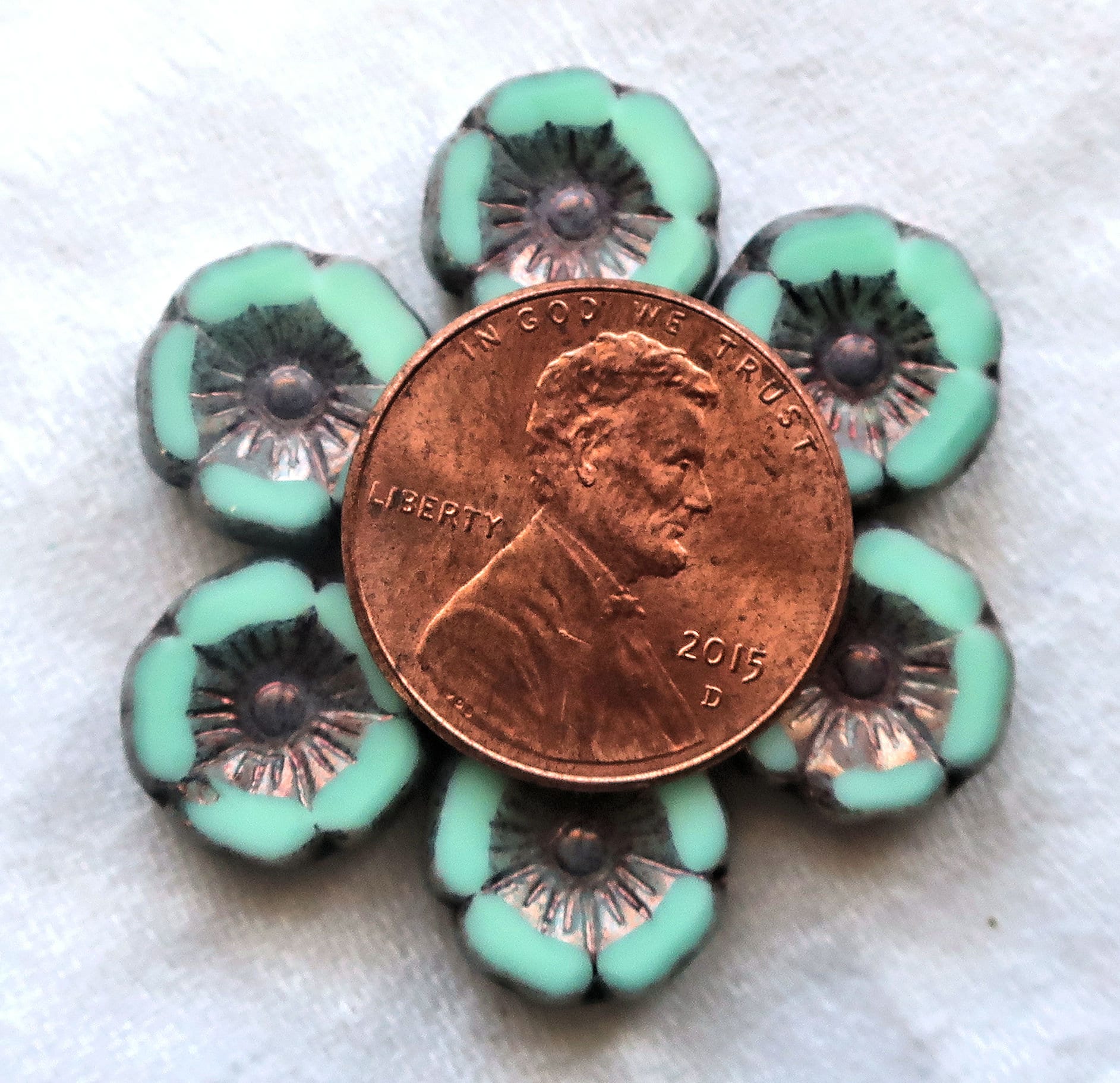 8 Czech glass flower beads - 12mm - mint green w/ a metallic picasso finish - table cut Hawaiian hibiscus floral beads - C05201