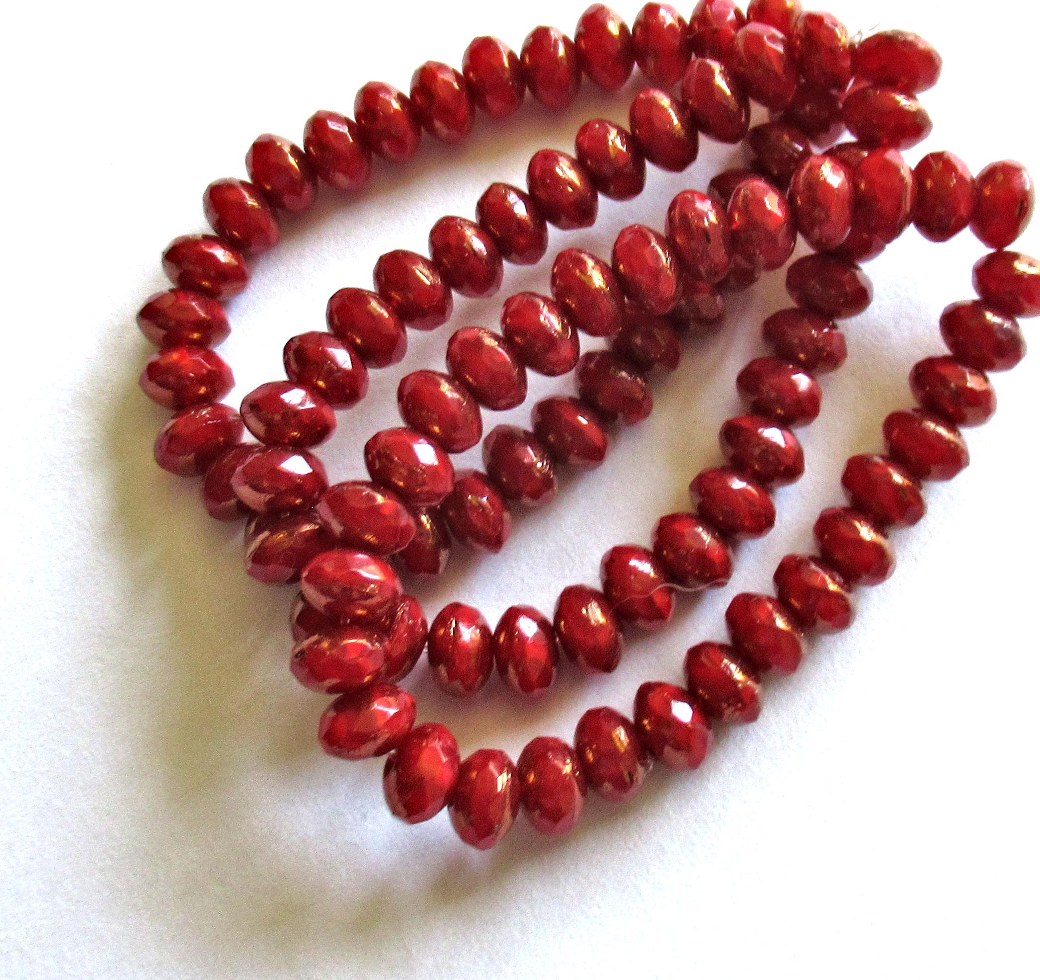 30 small Czech glass puffy rondelle beads - 3mm x 5mm - deep red with bronze accents - faceted fire polished - 00041