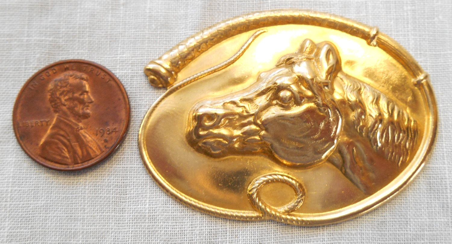 1 large raw brass stamping, a horse's head within a whip, a pendant, charm, connector, ornament, 52mm by 37mm USA made 6501 - Glorious Glass Beads