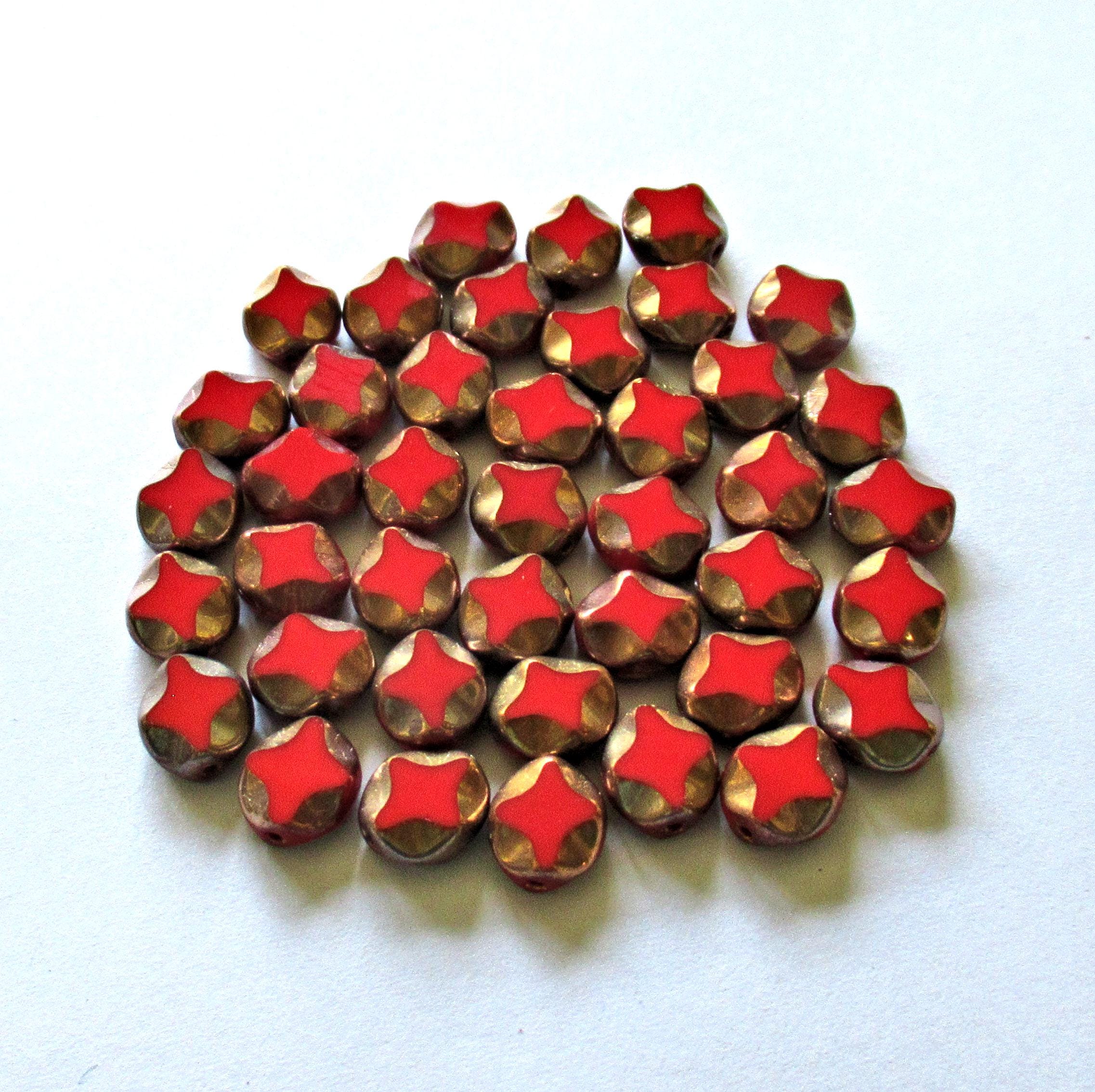 10 Czech glass oval beads - 9 x 8mm - red oval with gold accents - carved table cut beads with a diamond pattern - C00121