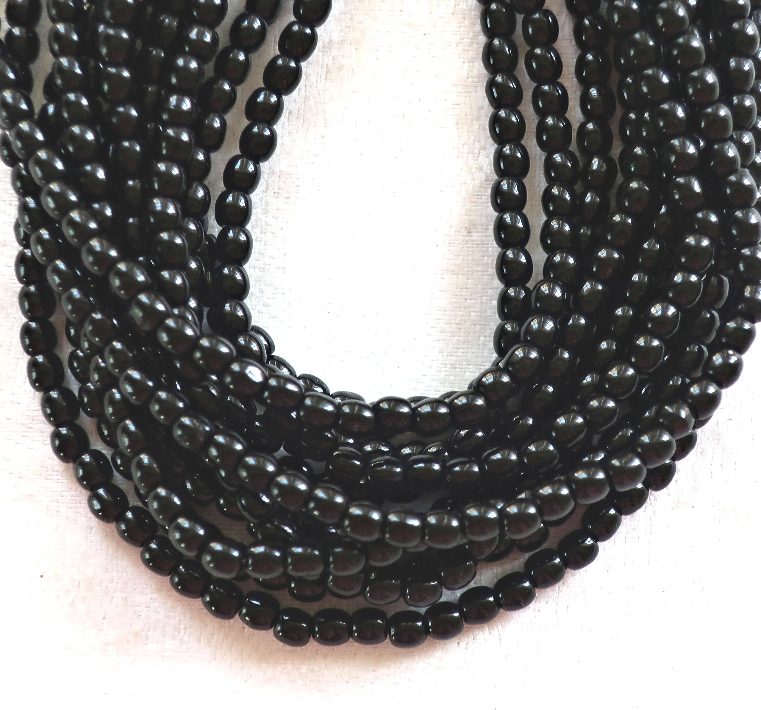 Lot of 100 4mm jet black Czech glass druks, smooth round druk beads C4301