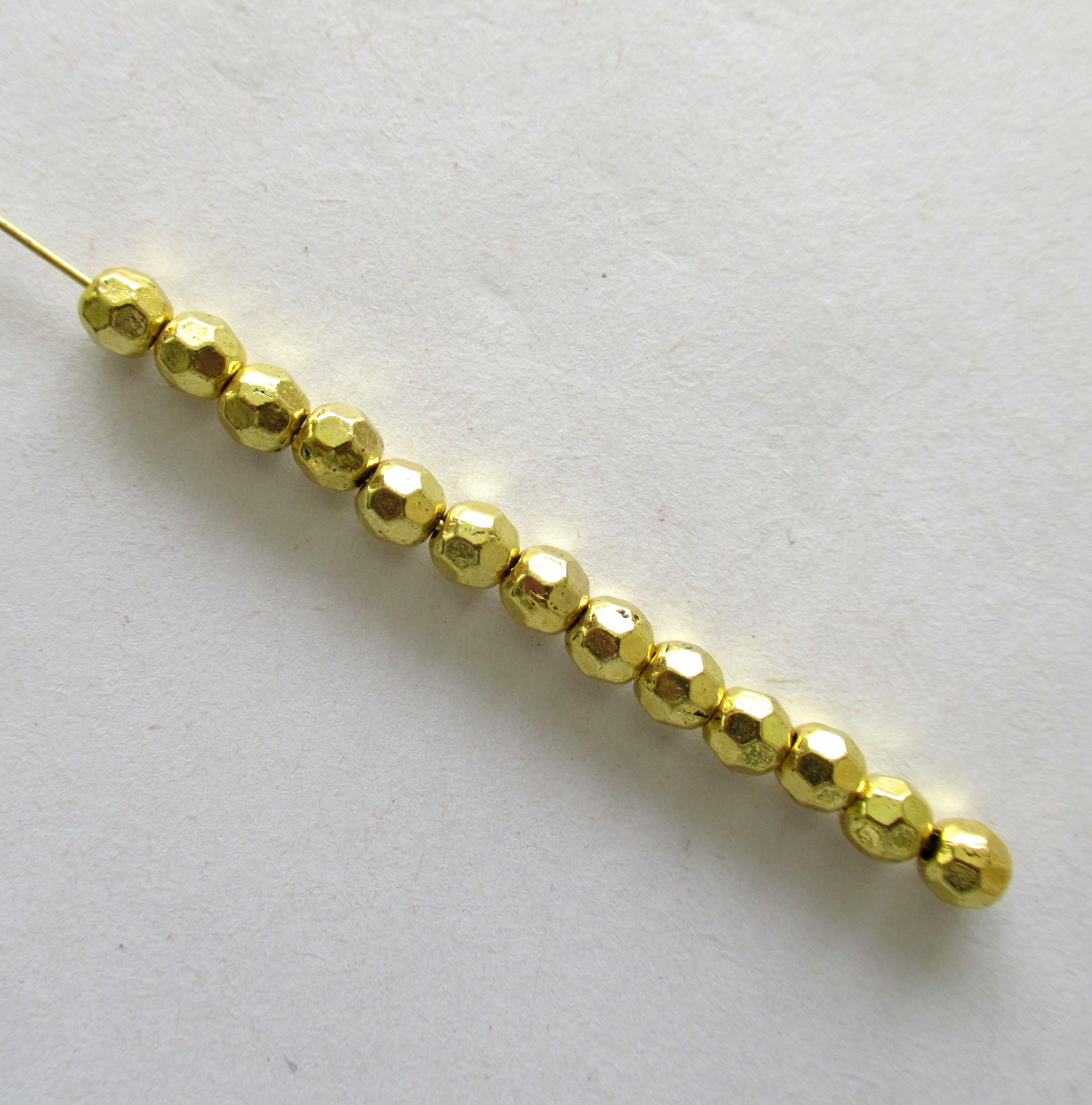 Gold tone metal alloy beads - 5mm - faceted round beads - 30 pieces - C0074