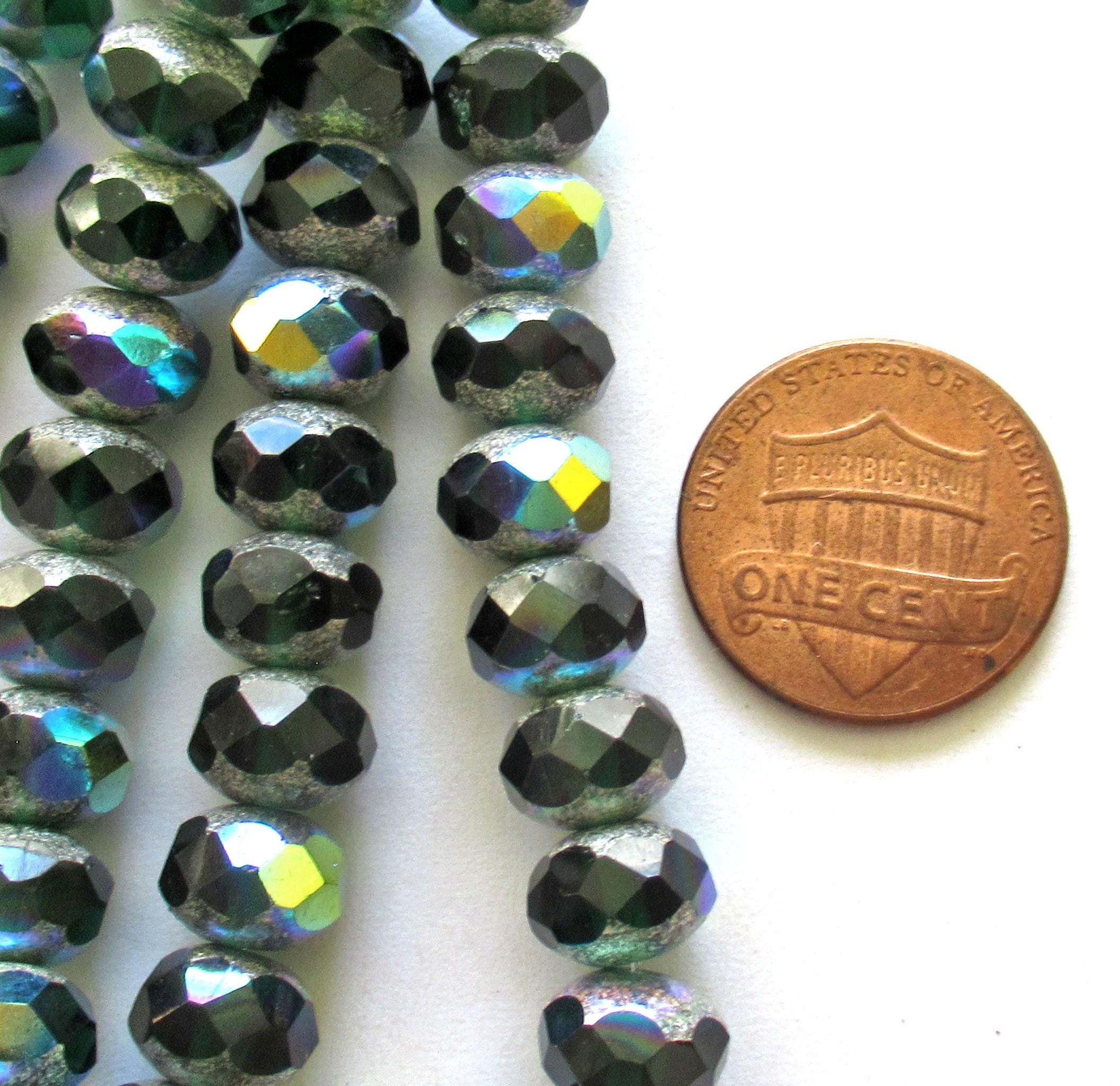 25 Czech glass puffy rondelle beads - 8 x 6mm - transparent dark emerald or forest green w/ silver & ab accents - 00362