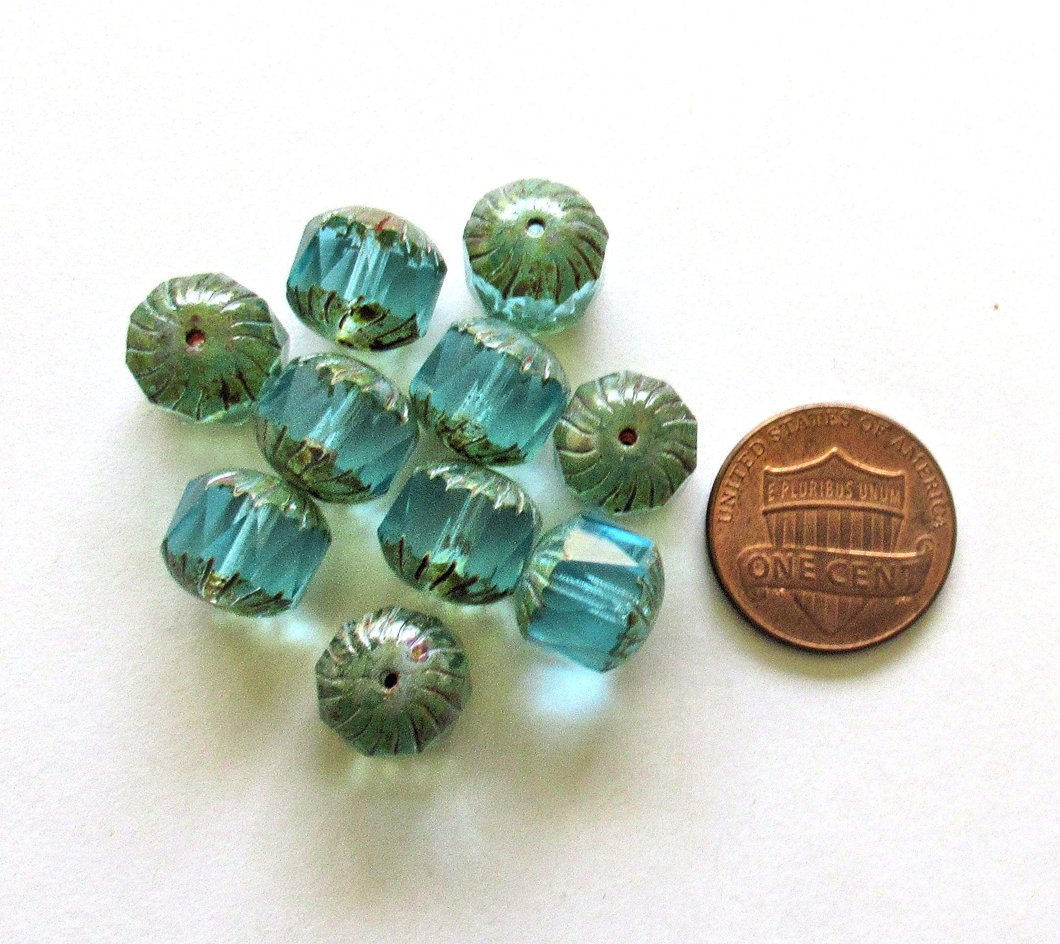 Ten Czech glass faceted carved cruller beads - 10mm - transparent aqua blue - cathedral beads w/ picasso accents on the ends - 00004