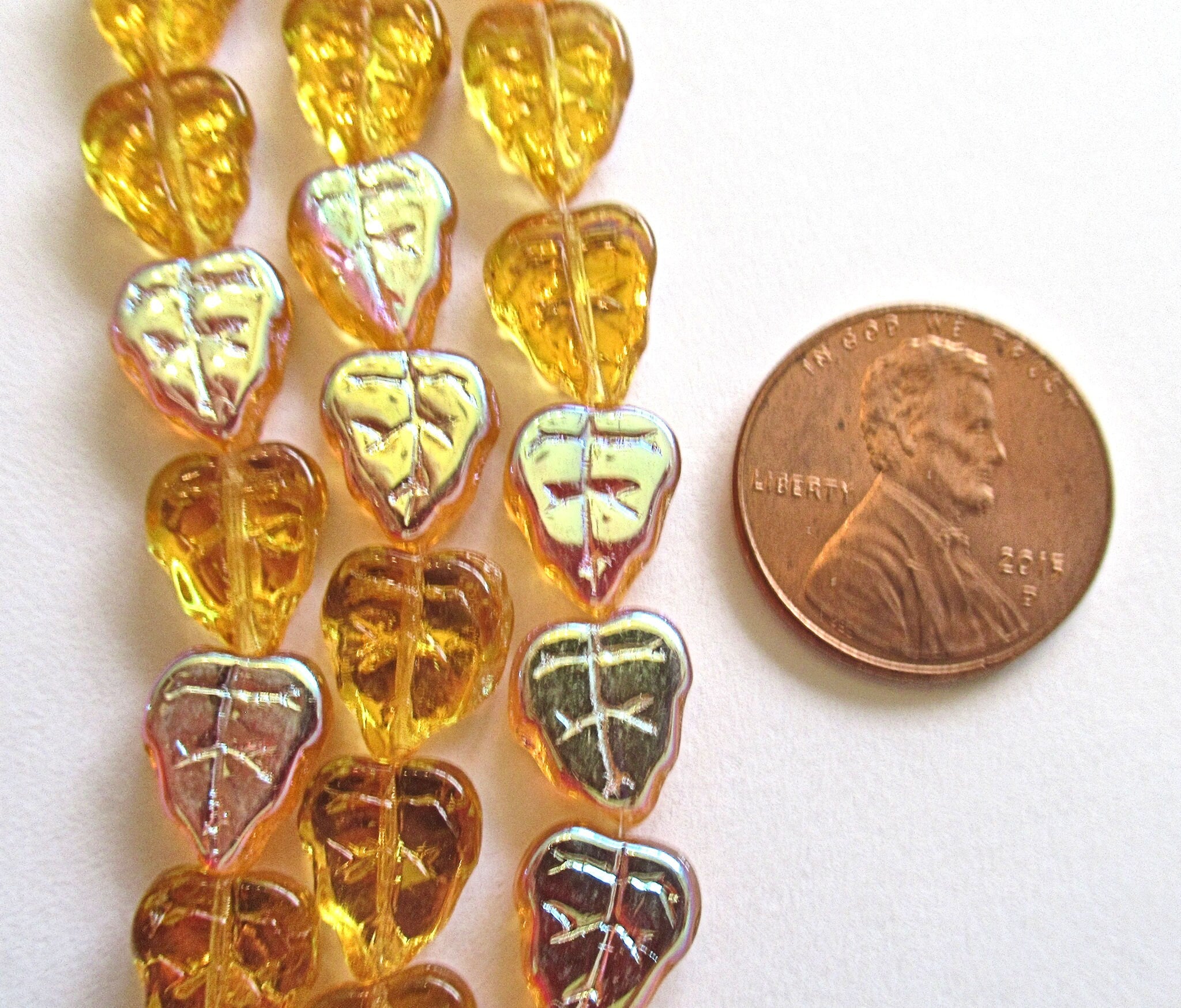 Lot of 25 Czech glass leaf beads - Amber Topaz AB - center drilled 8 x 10mm beads C0035