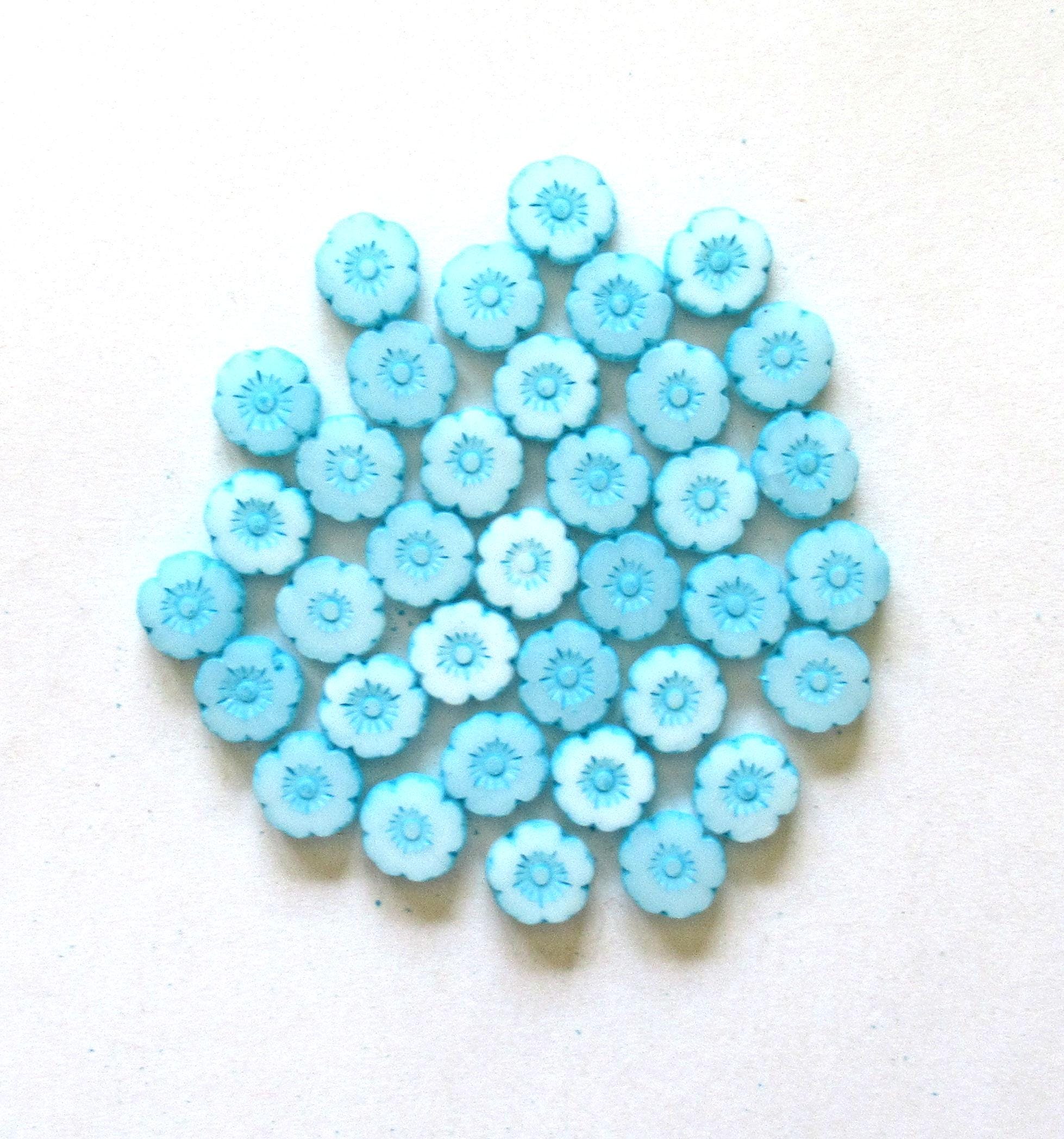 15 Czech glass flower beads - 8mm - milky white w/ a baby blue wash - table cut - carved - Hawaiian hibiscus flower beads C00541
