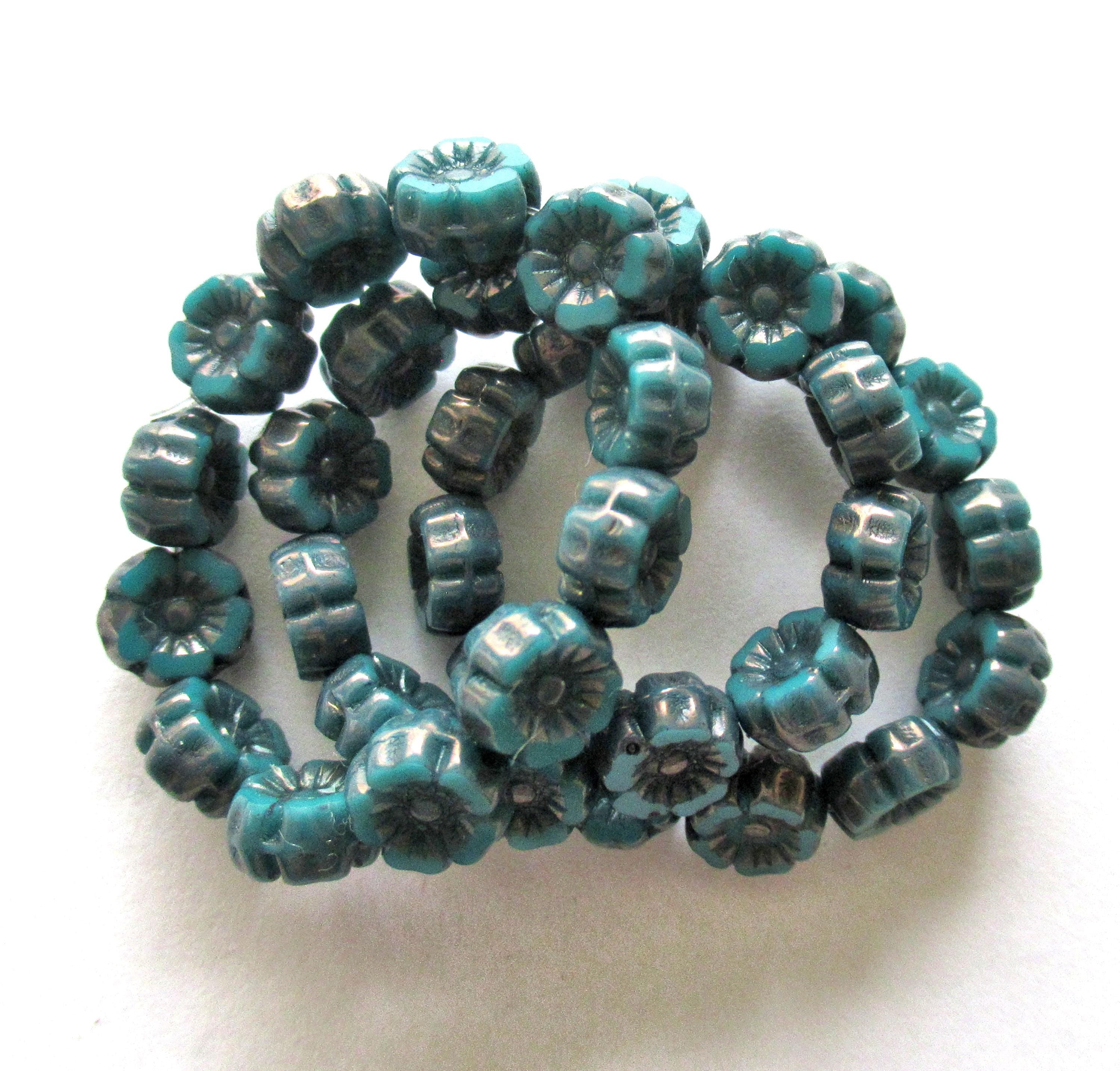 12 small 7mm Czech glass flower beads - teal or Persian turquoise blue green Hawaiian flowers w/ bronze accents - table cut - beads C00071