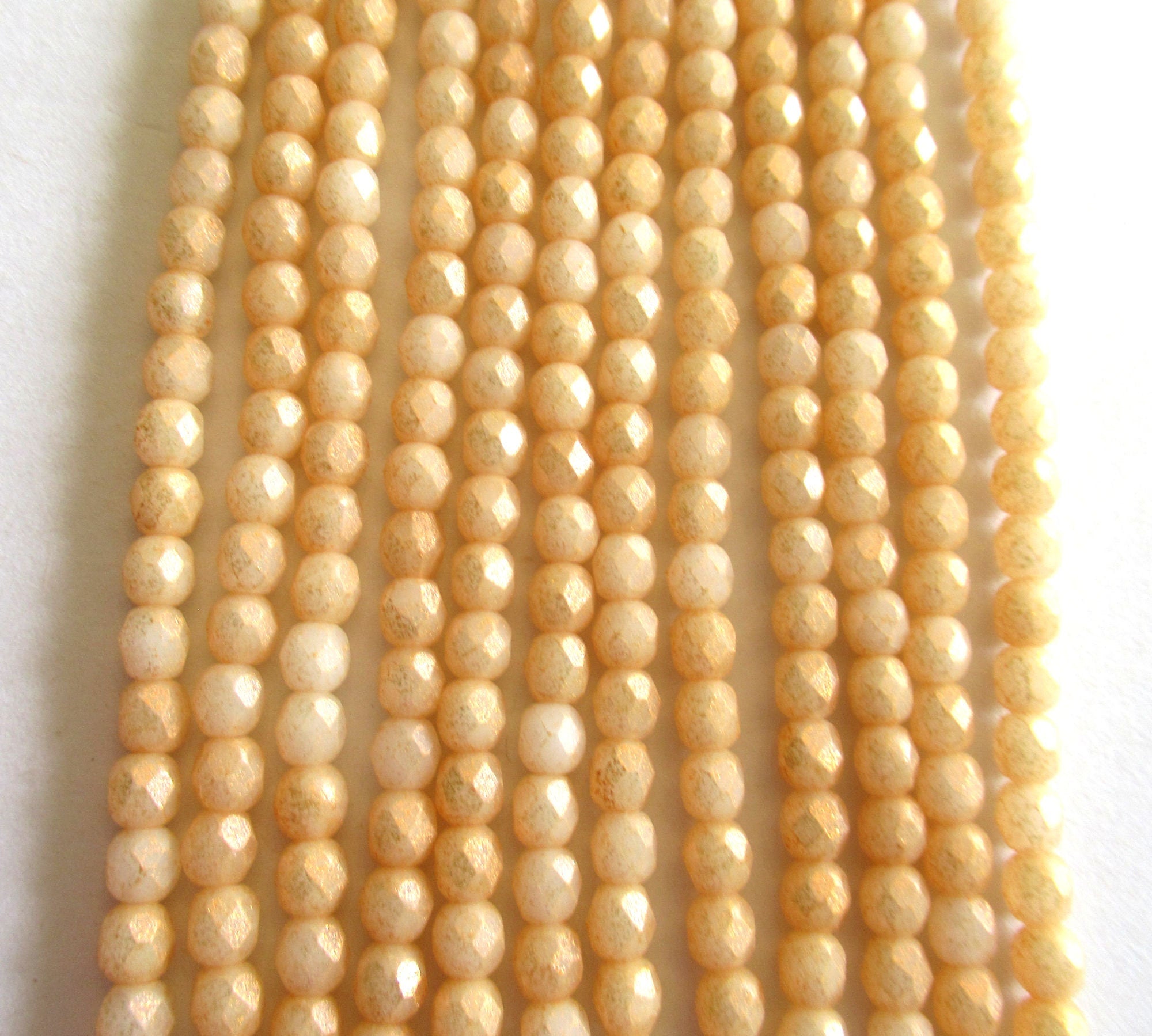 50 4mm Czech glass beads - Milky Antique Shimmer - off white beads w/ gold finish - round faceted fire polished beads - 0014