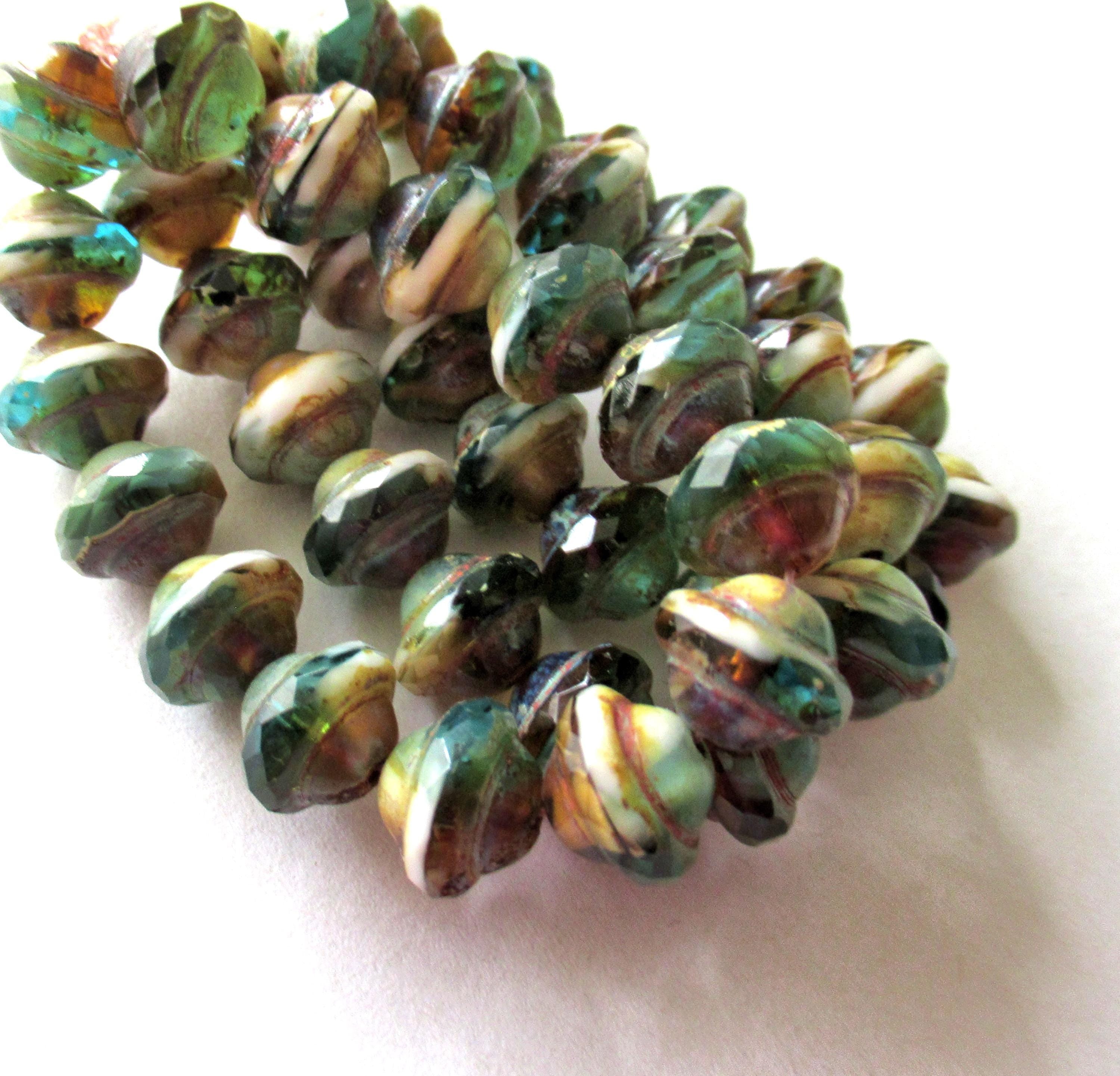 Fifteen Czech glass faceted saturn / saucer beads - 8 x 10mm - amber / blue green & white marbled mix with a picasso accents - C00302