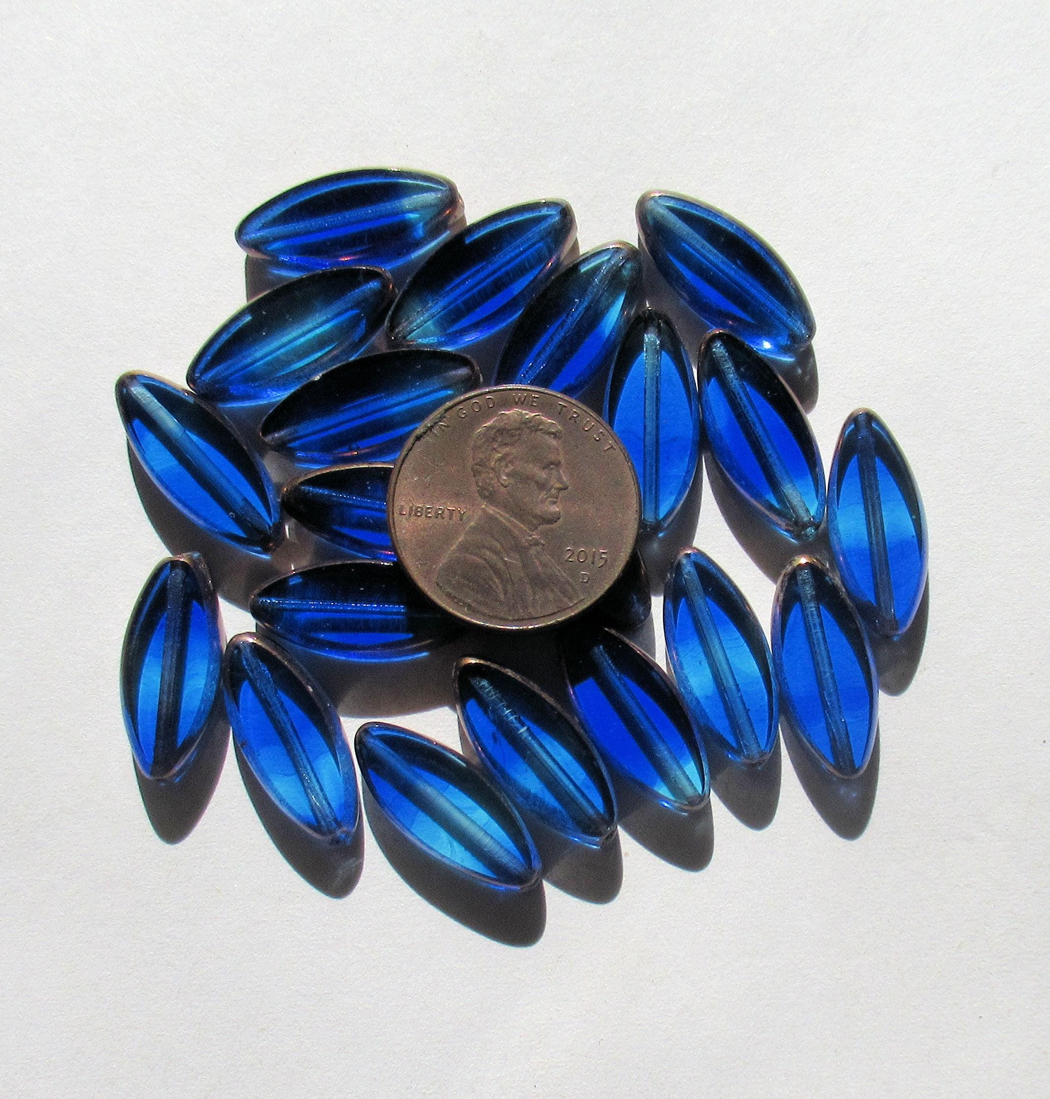 Ten Czech glass spindle beads - transparent marbled mix of sapphire and aqua blue - 18 x 7mm - table cut beads - C00012