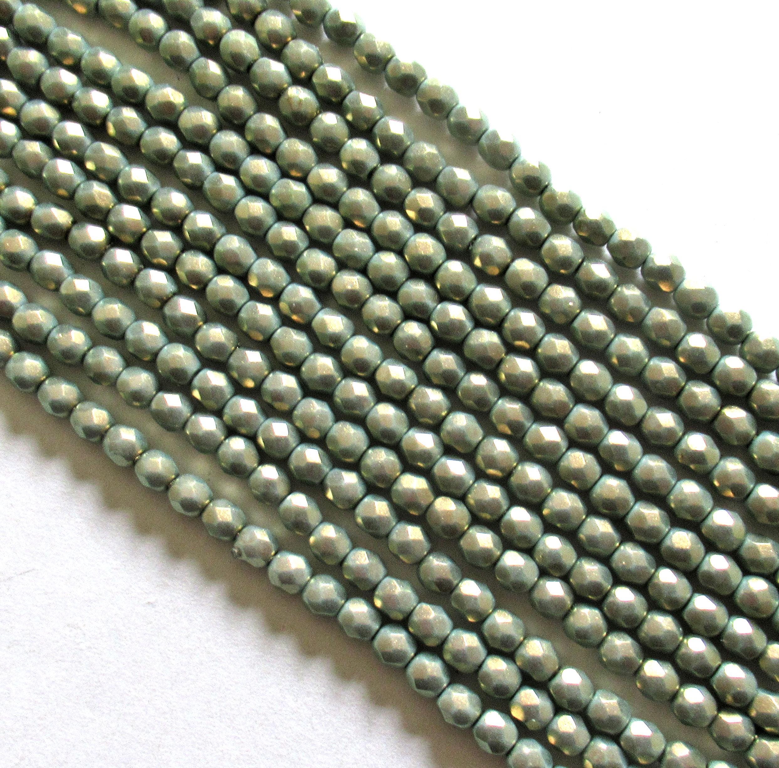 50 4mm Czech glass beads - Halo Ethereal Heavens - light green faceted round beads with a shiny gold finish - C00039