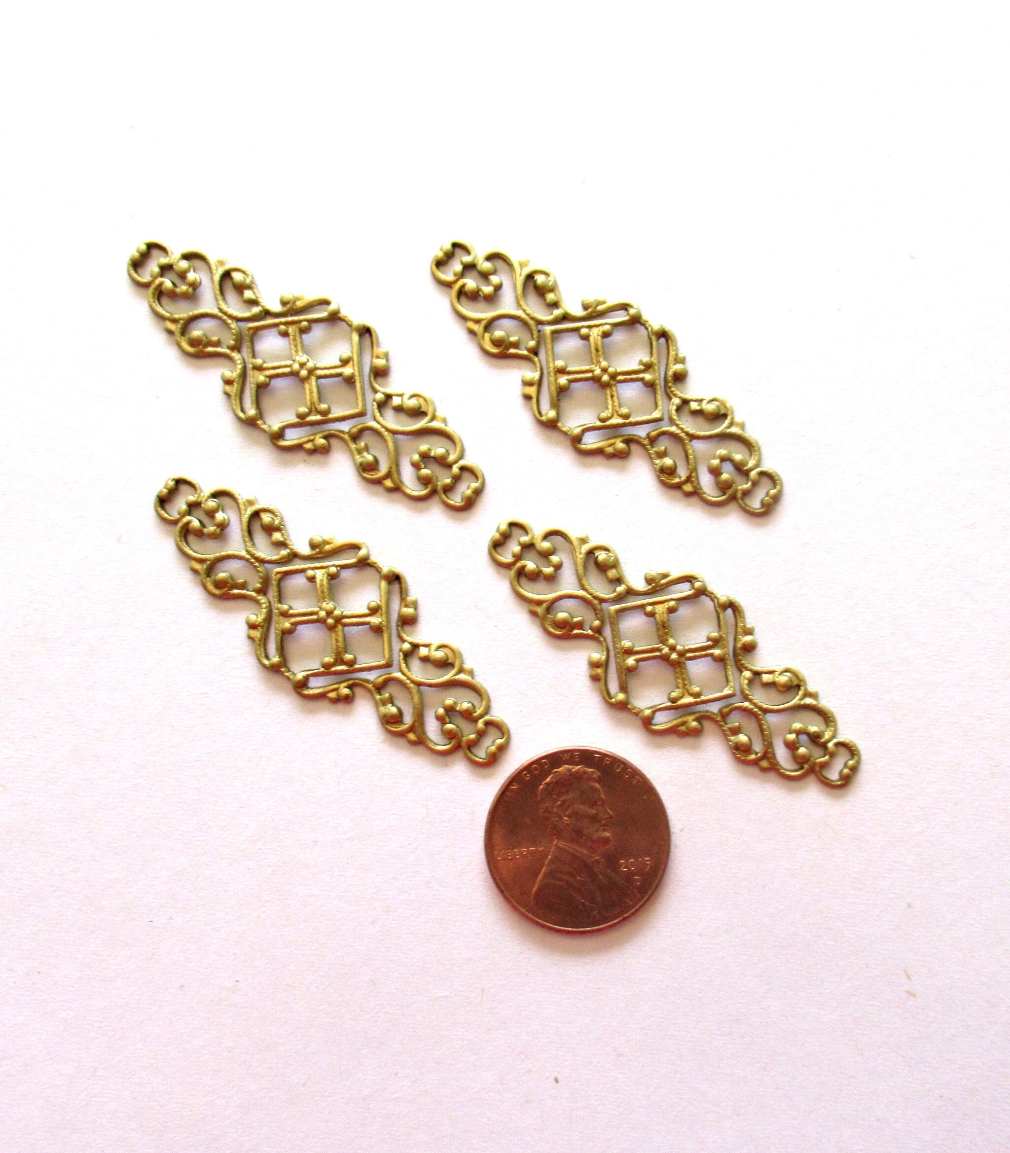 Four raw brass stampings - ornate Victorian connectors with rings - 1.75" x .75" inches USA made C00441