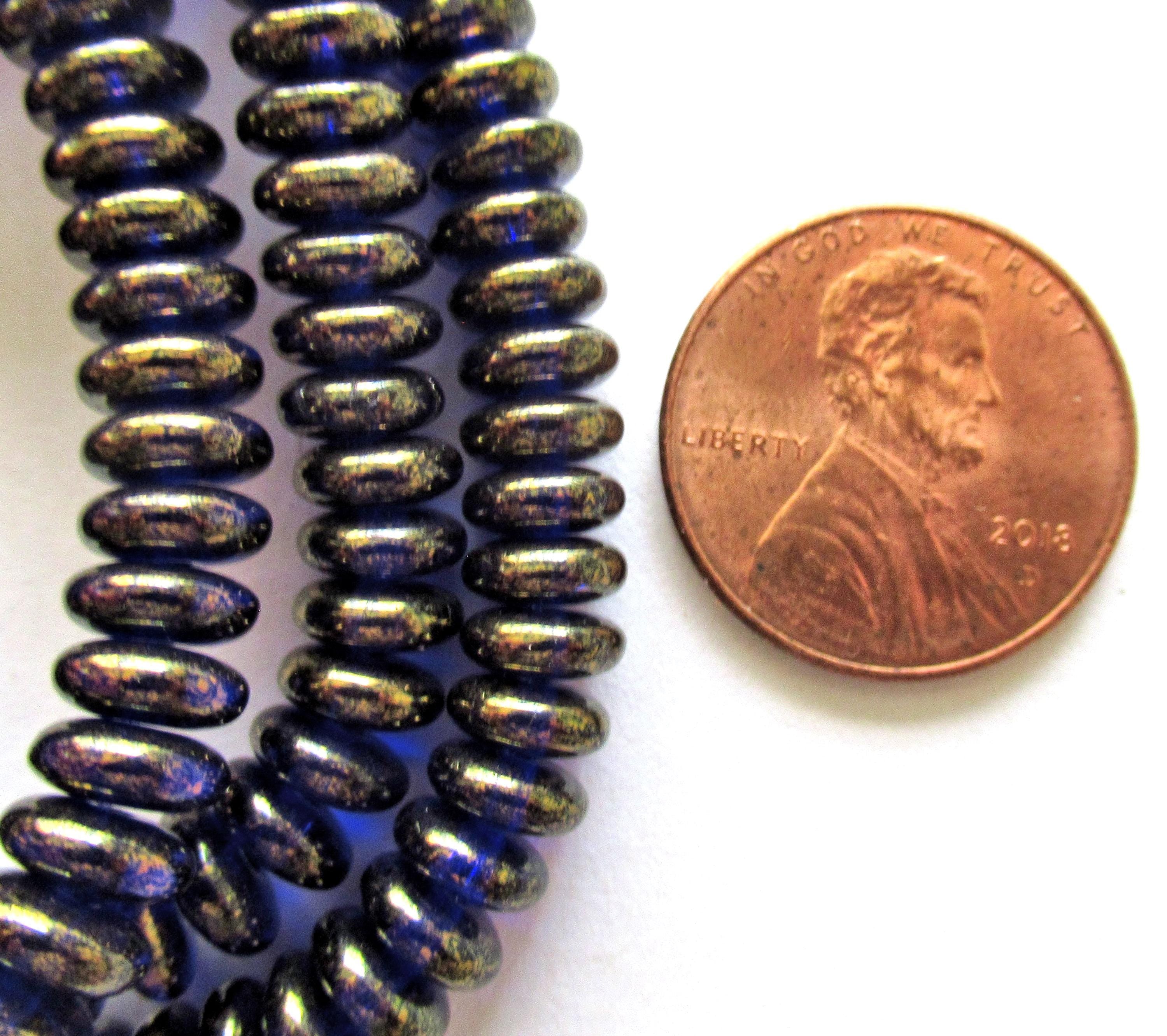 Lot of 50 6mm Czech glass rondelle spacer beads - transparent cobalt blue flat spacers with a bronze luster finish C00521