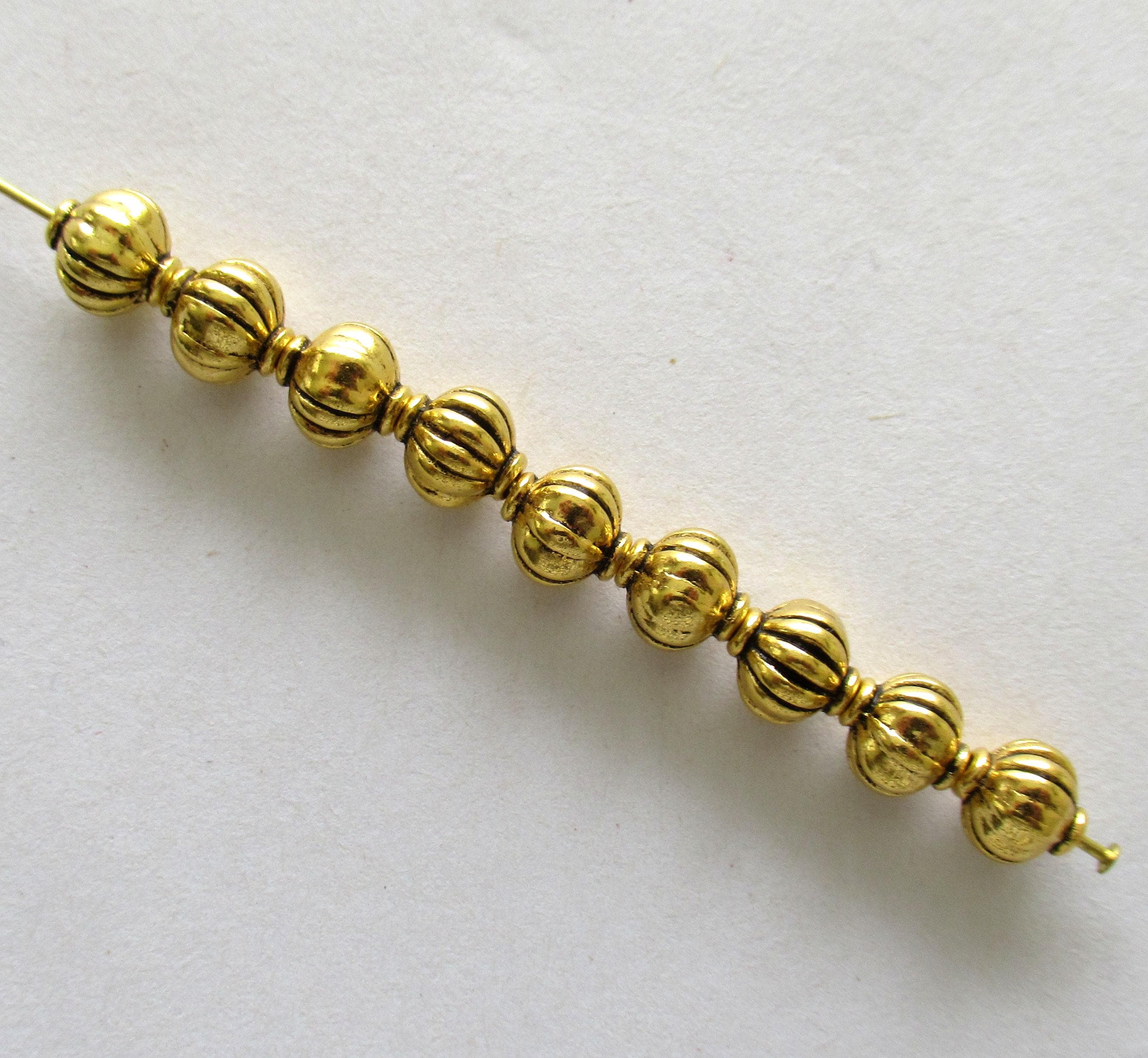Antique Tibetan style gold tone metal alloy beads - 7mm - pumpkin shaped lantern spacer beads - 25 pieces - C0038
