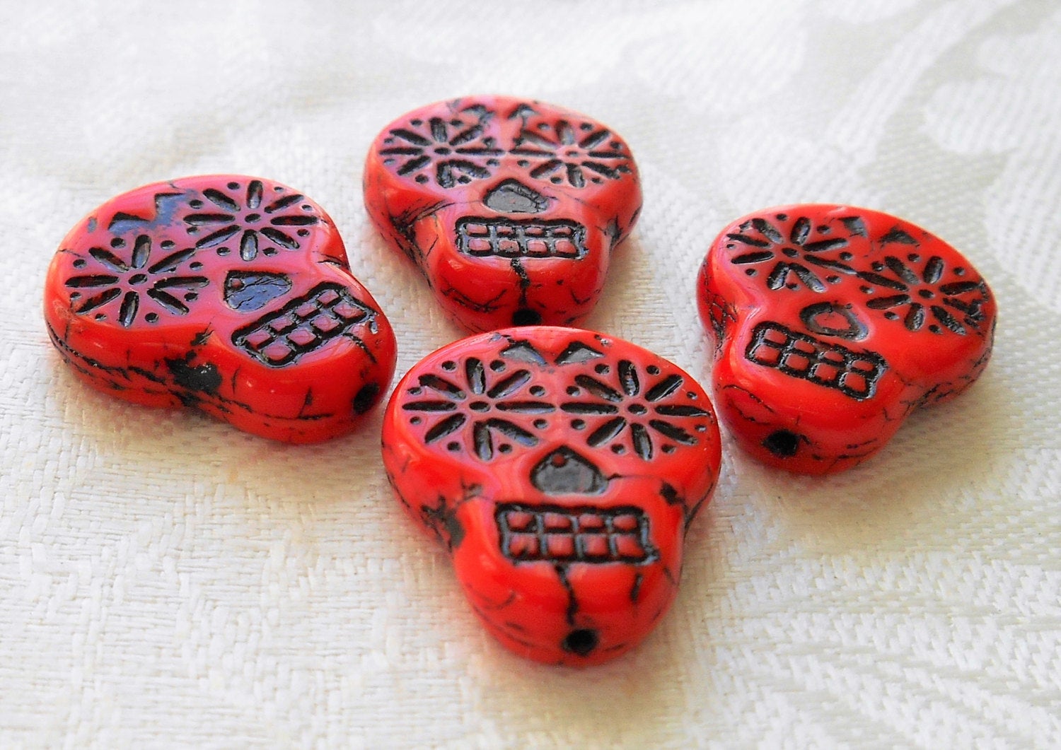 Four large red & black Czech glass skull beads, opaque red glass with black wash, focal beads, 20mm x 17mm C02101