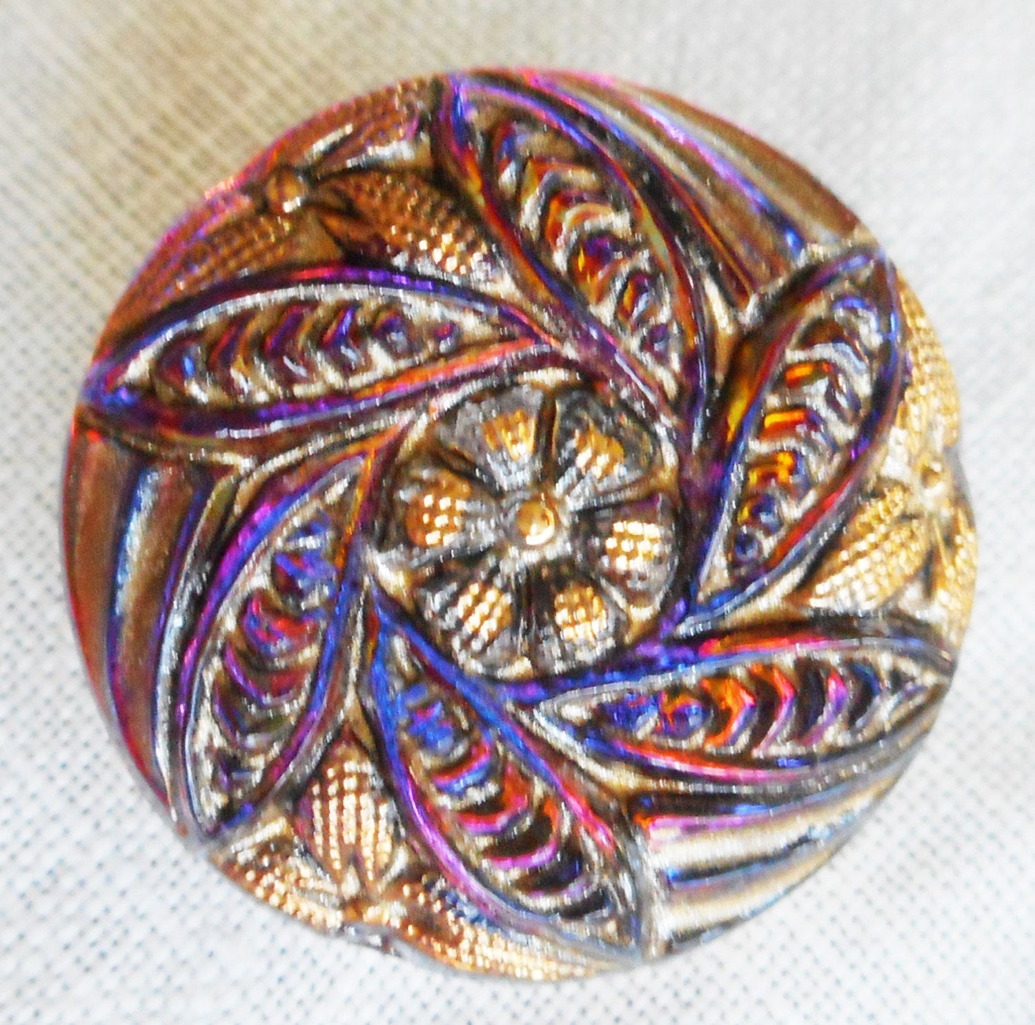 One 18mm iridescent Czech glass button, blue, red and purple floral swirl pattern with gold highlights , decorative shank buttons 03201