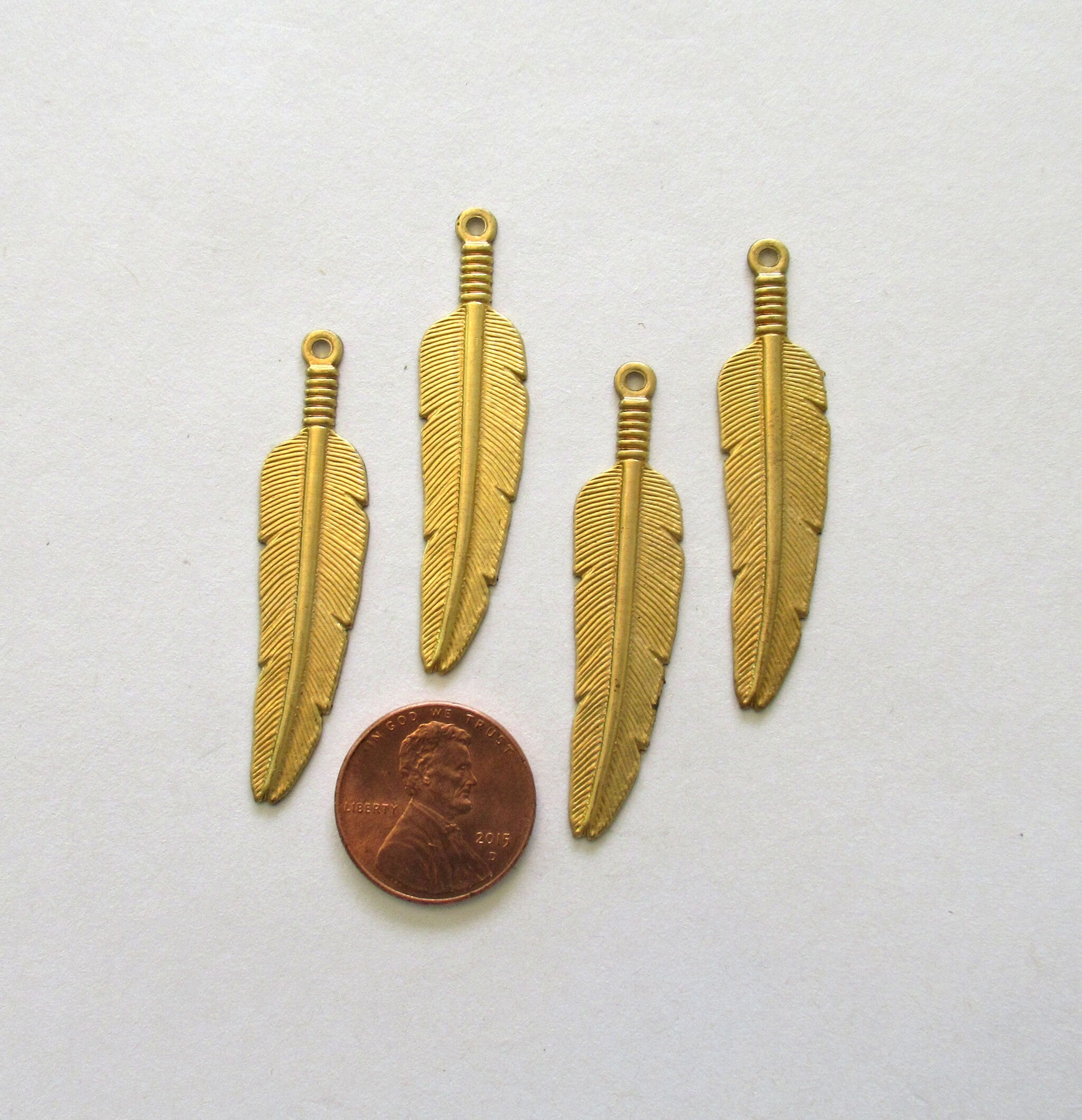 4 Raw Brass Stampings - feather dangles - charms - drops - earrings - 1.75 by .5" inches - made in the USA C00801