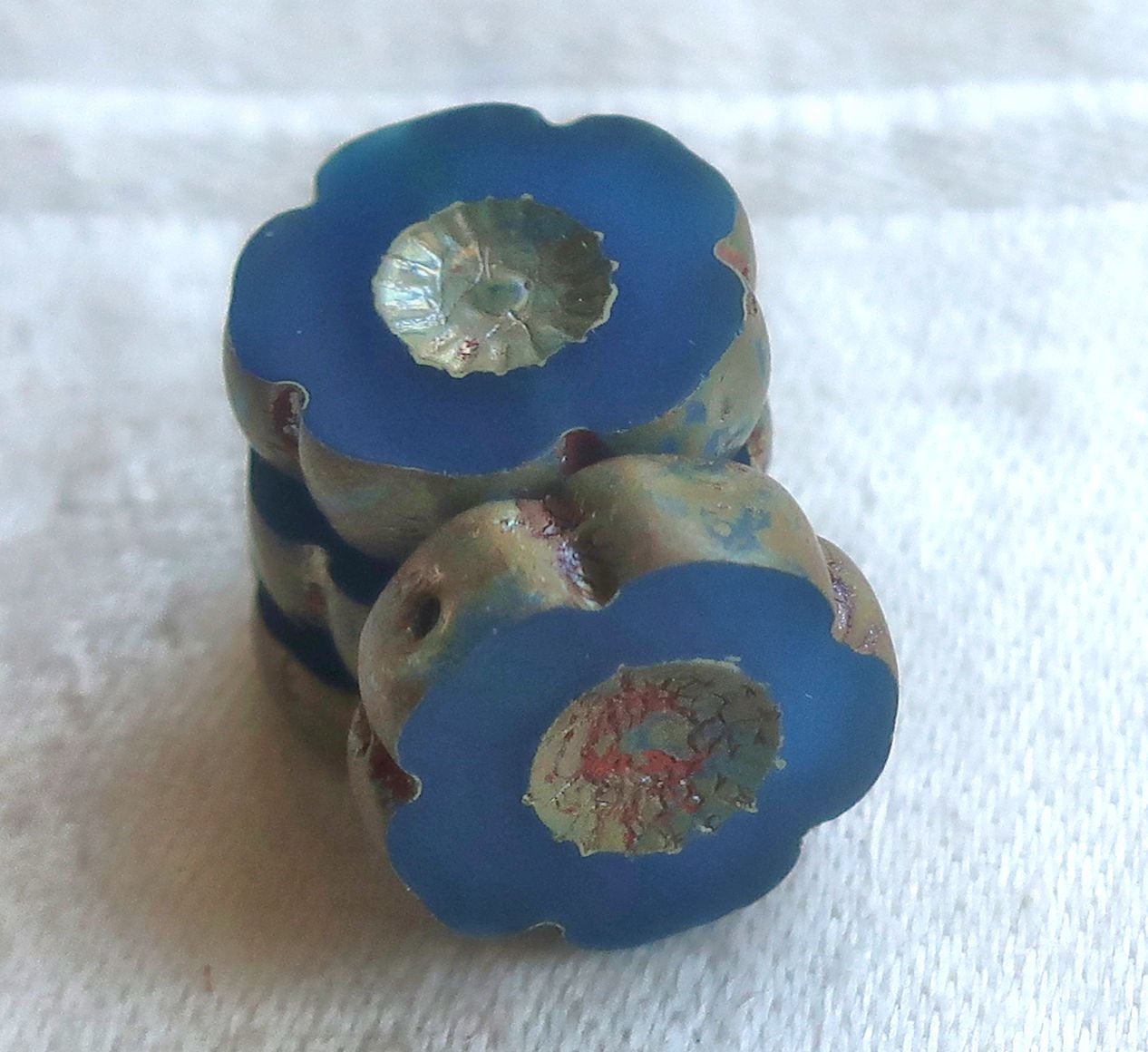 Six 14mm Czech glass flower beads. table cut, carved, translucent capri blue with a picasso finish, Hawaiian flowers C02101