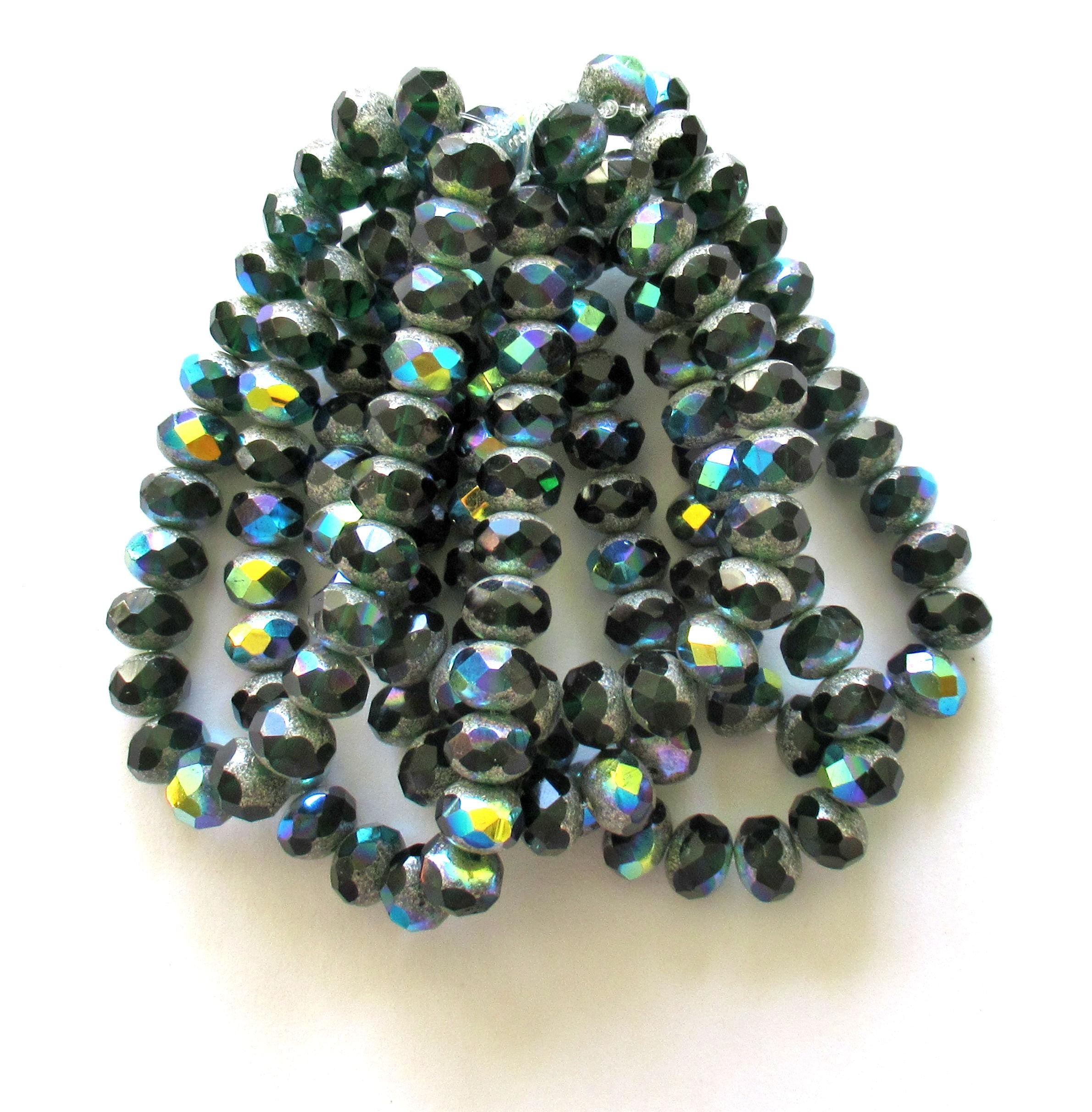 25 Czech glass puffy rondelle beads - 8 x 6mm - transparent dark emerald or forest green w/ silver & ab accents - 00362