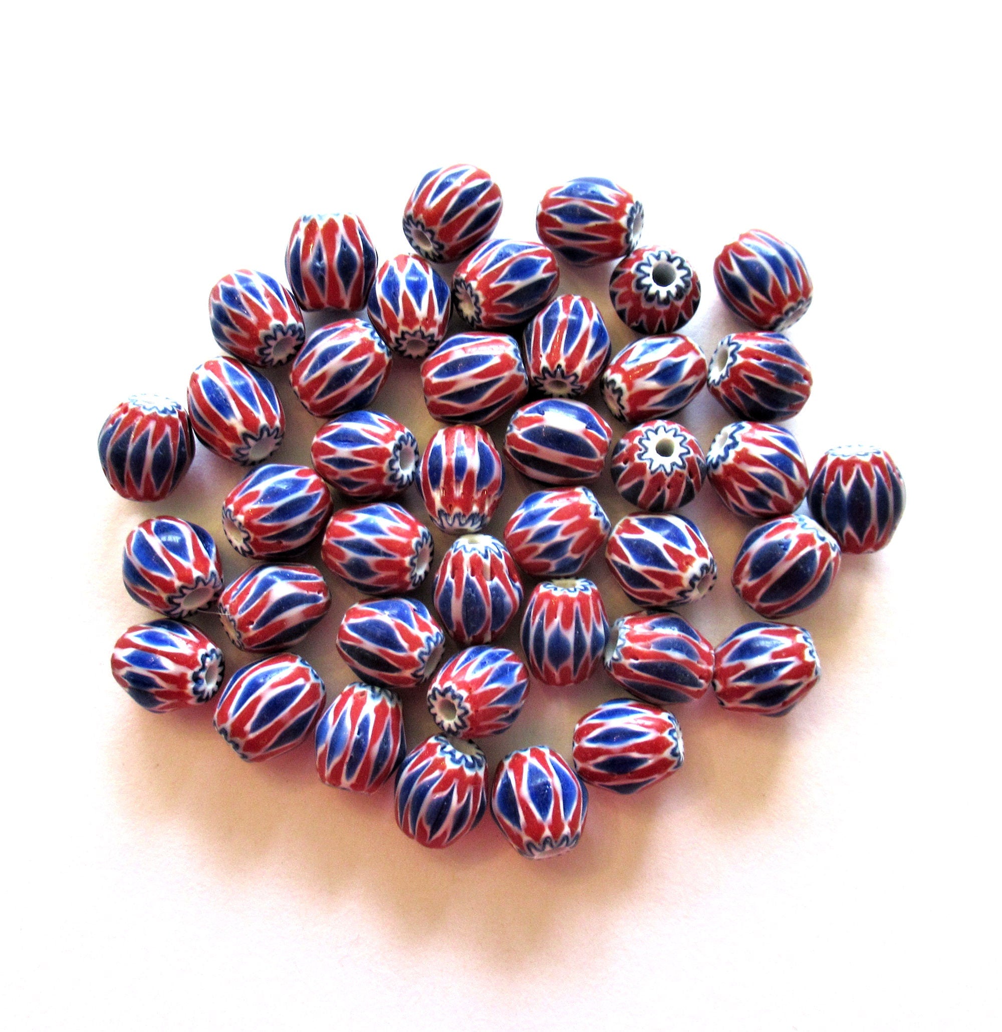 Lot of 15 blue, white and red striped glass chevron Beads - approx 9 x 8.5mm oval beads - rustic earthy beads made in India C0025
