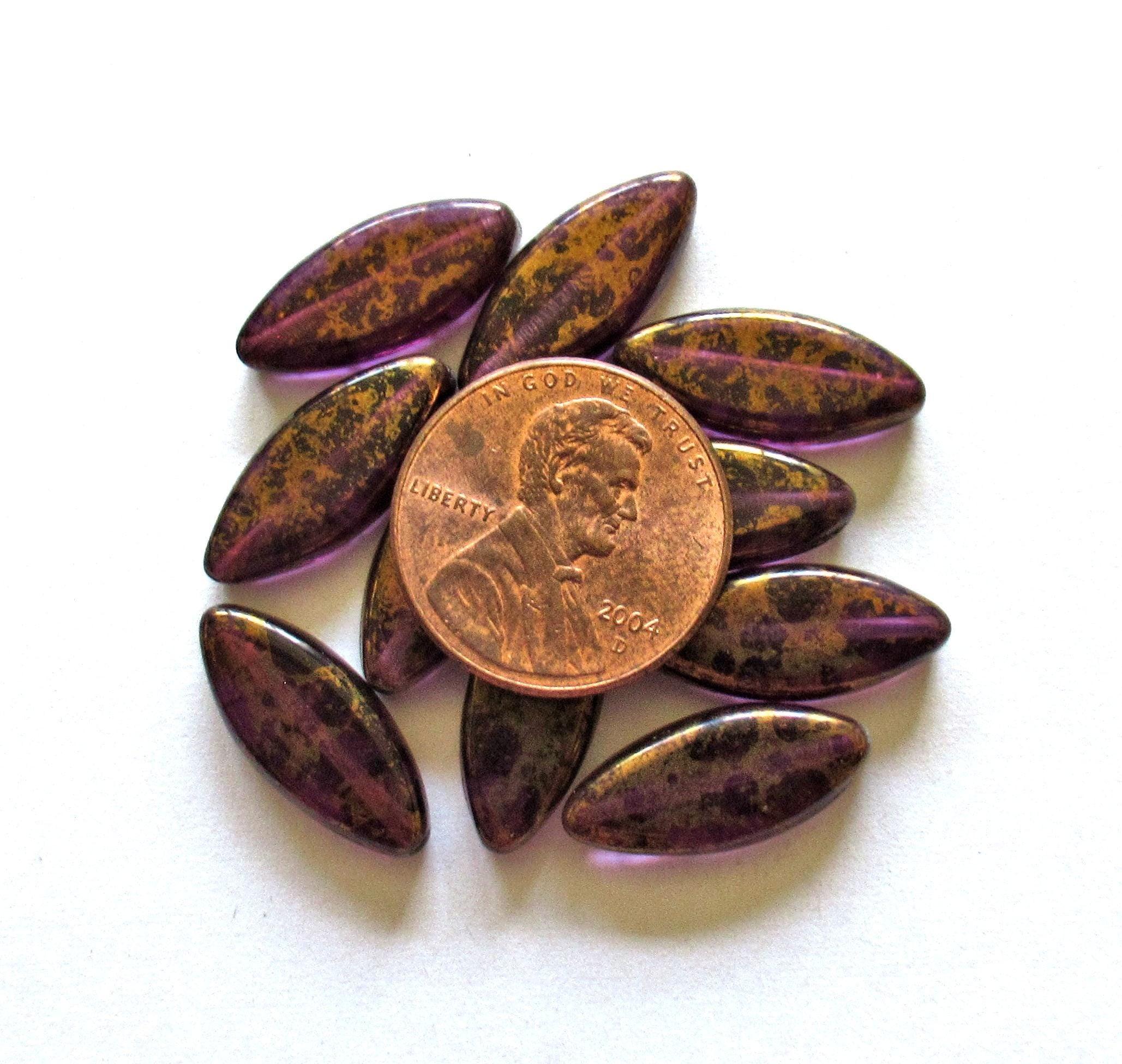 Ten Czech glass spindle beads - 18mm x 7mm - amethyst or purple with a splotchy bronze finish - table cut beads C00522