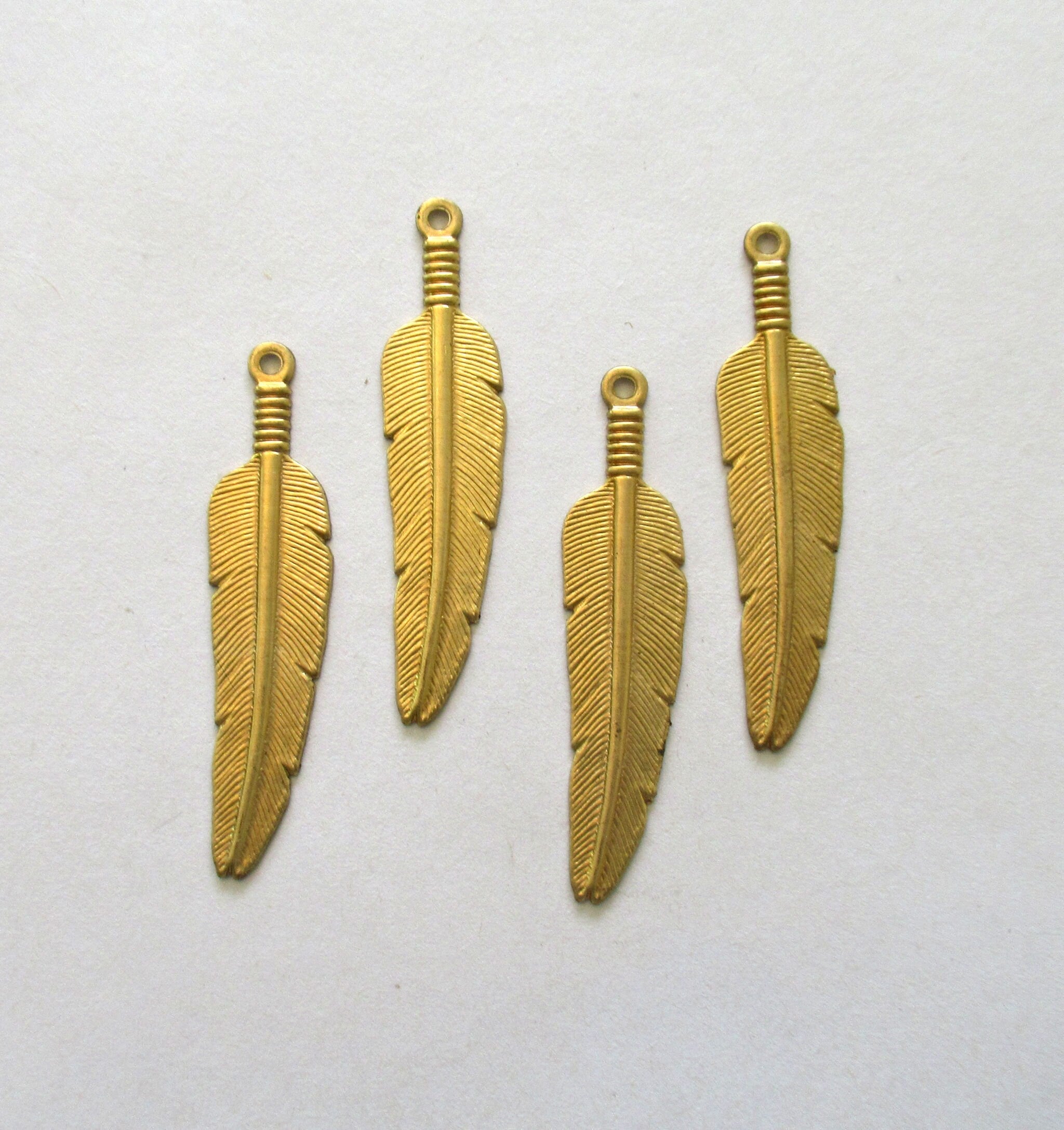 4 Raw Brass Stampings - feather dangles - charms - drops - earrings - 1.75 by .5" inches - made in the USA C00801