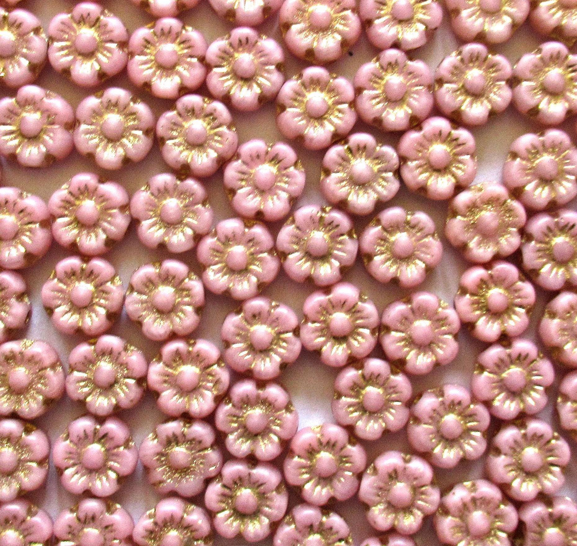 25 small Czech glass flower beads - 6mm - opaque pink with a gold wash - C0078