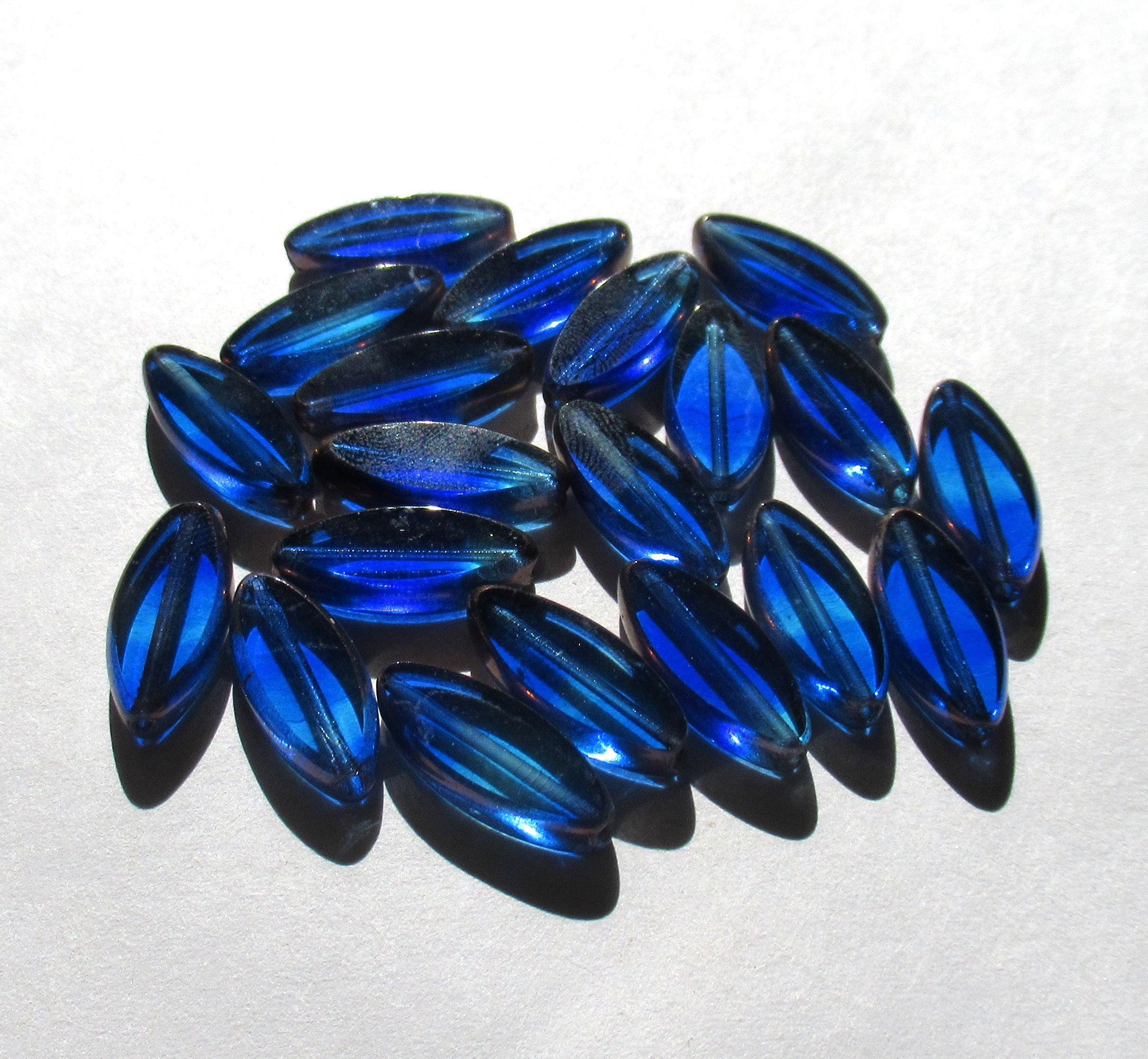 Ten Czech glass spindle beads - transparent marbled mix of sapphire and aqua blue - 18 x 7mm - table cut beads - C00012