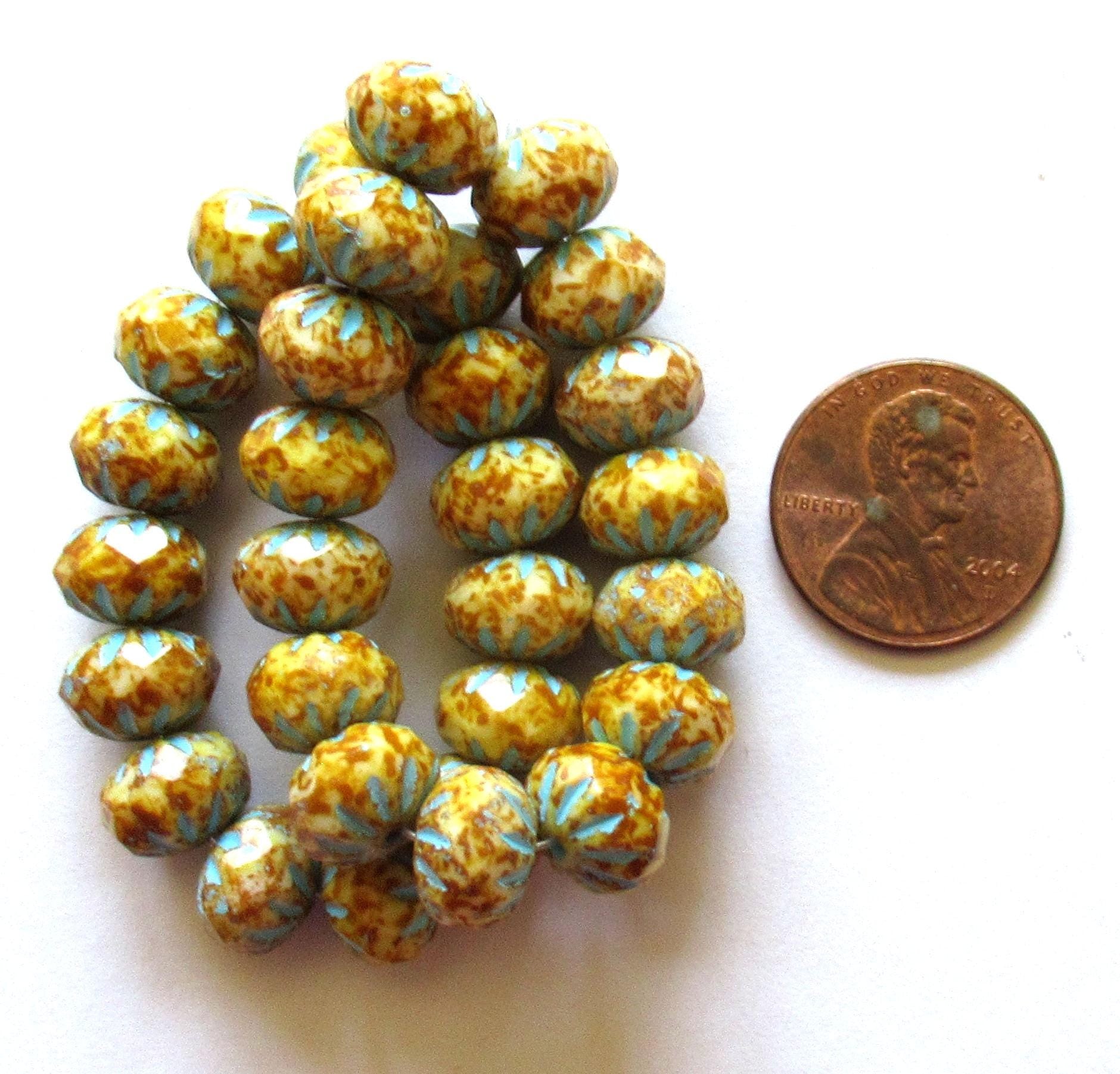 Ten Czech glass cruller beads - 7 x 10mm - off white w/ full picasso coat & blue wash - carved faceted rondelles - 00002