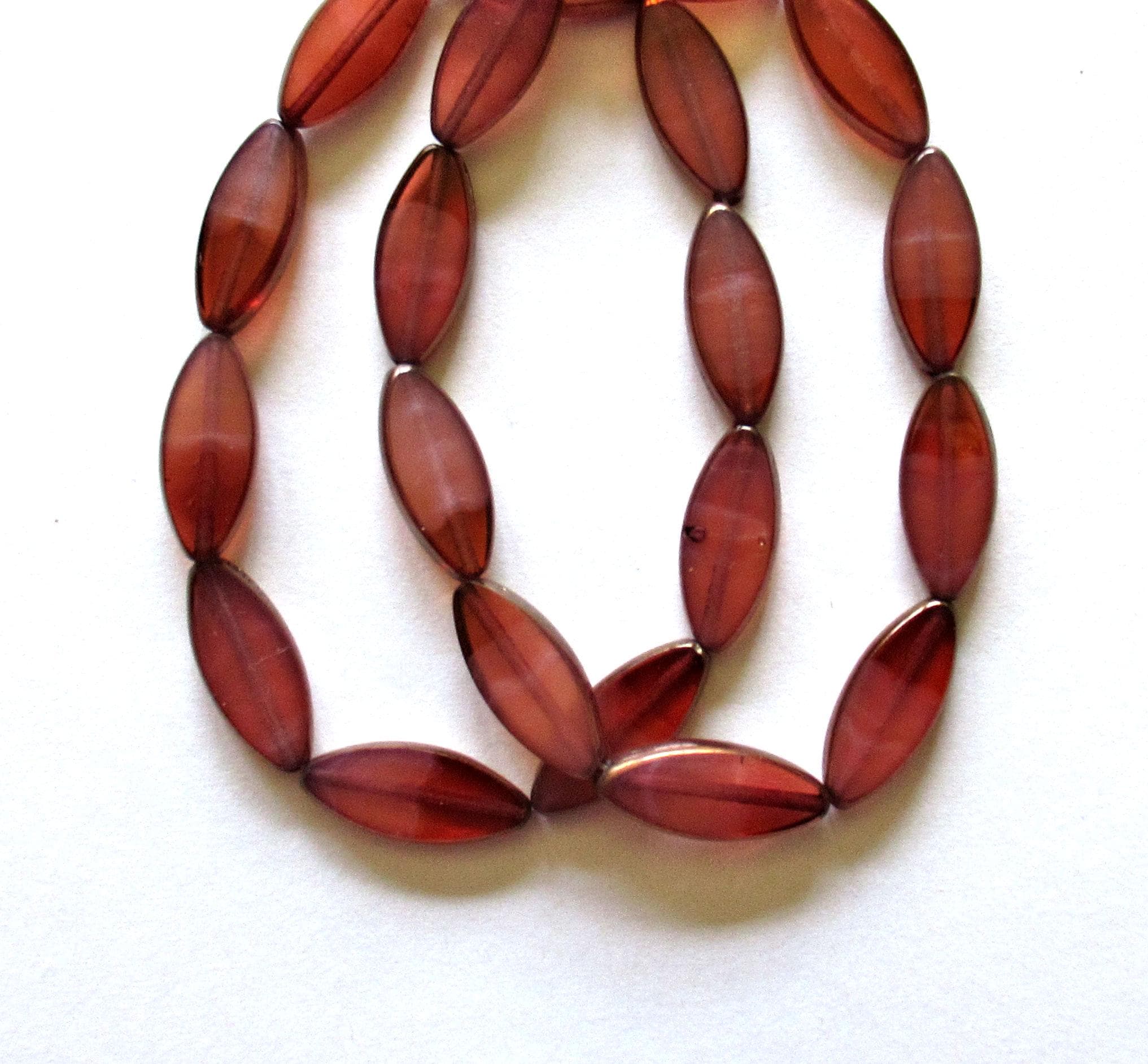 Ten Czech glass spindle beads - transparent & milky two tone pink w/ bronze - 18 x 7mm table cut beads C000404
