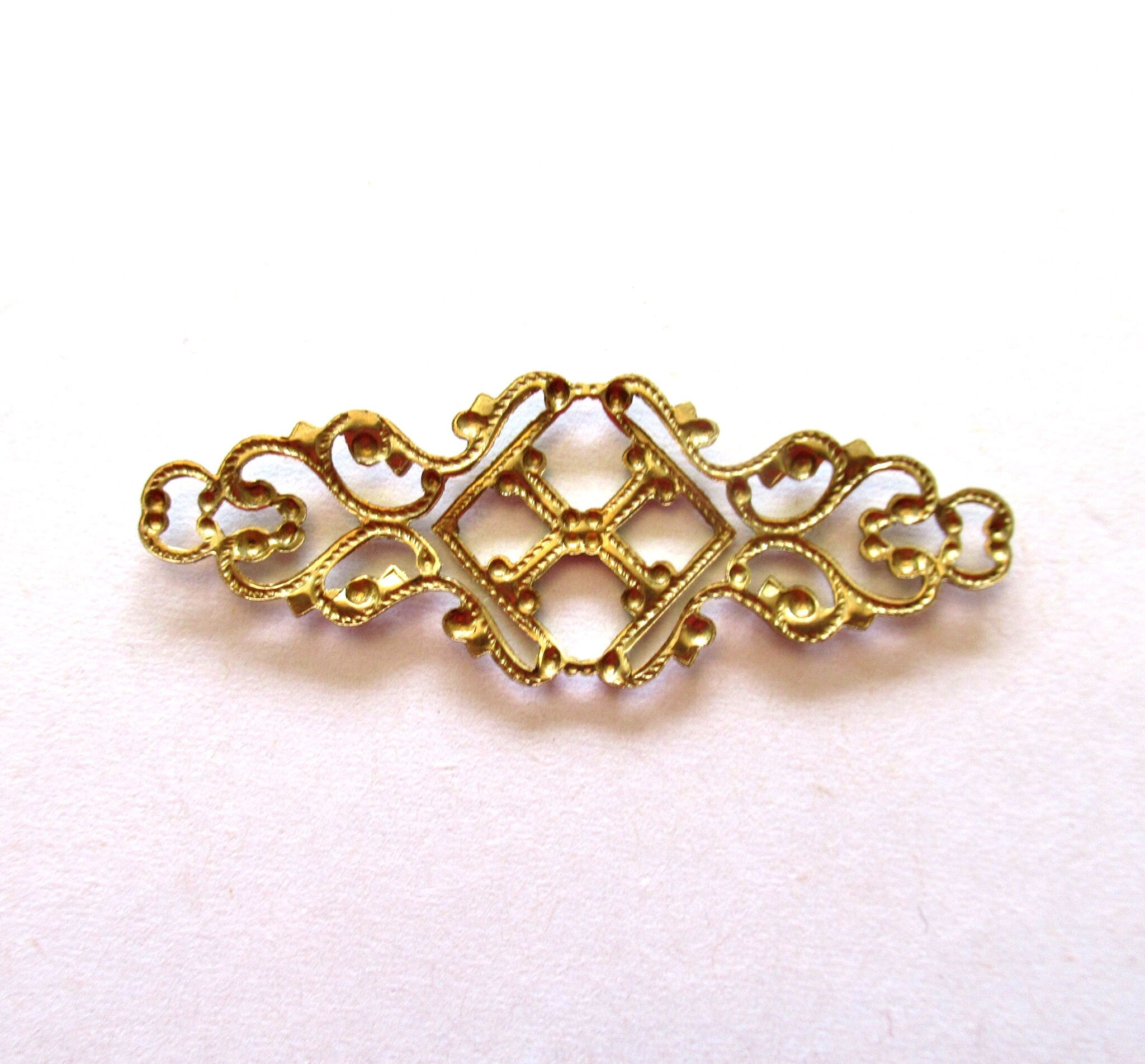 Four raw brass stampings - ornate Victorian connectors with rings - 1.75" x .75" inches USA made C00441