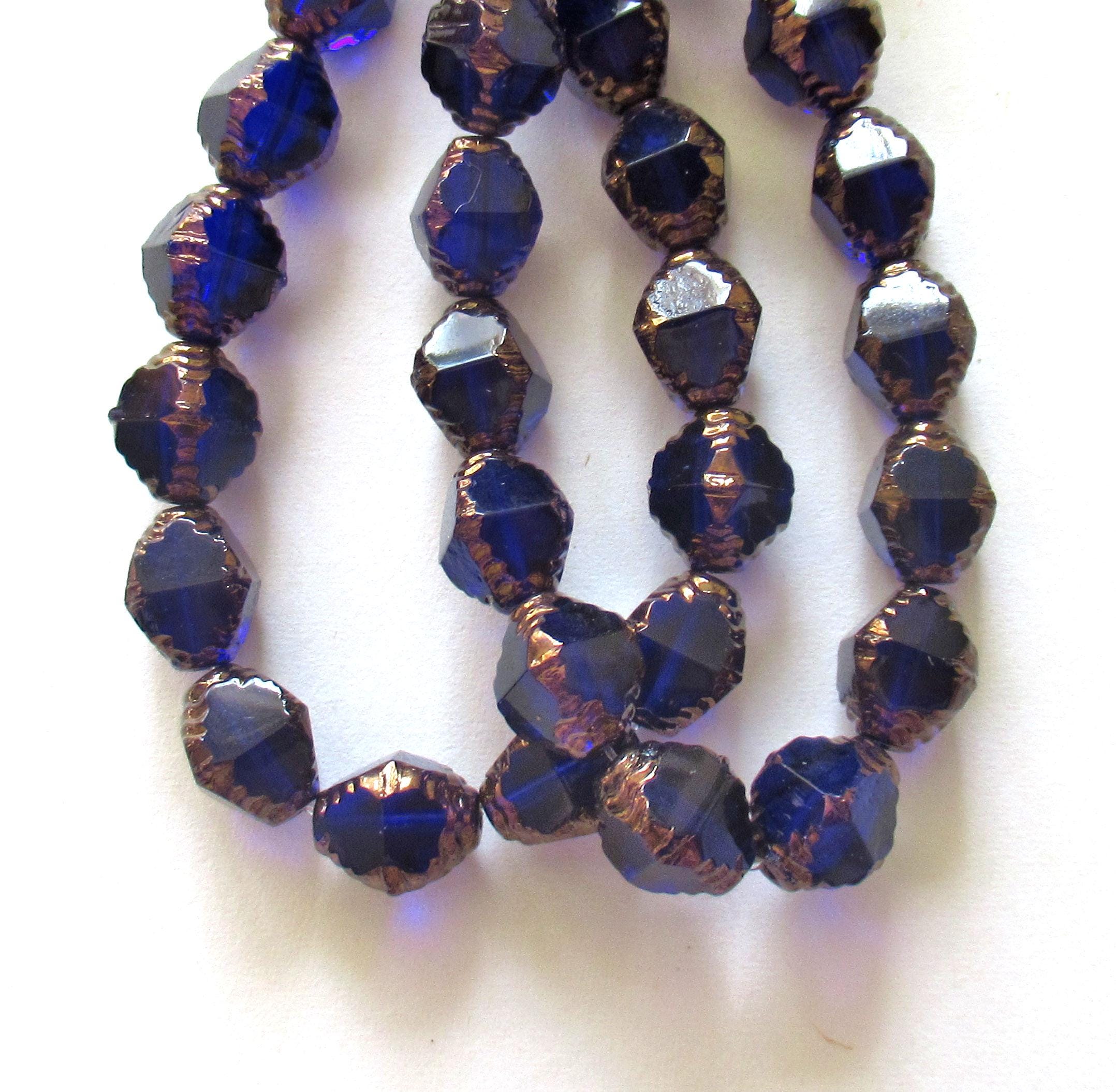 15 Czech glass bicones - 8 x 10mm cobalt blue w/ bronze accents - carved notched bicone beads - C00542