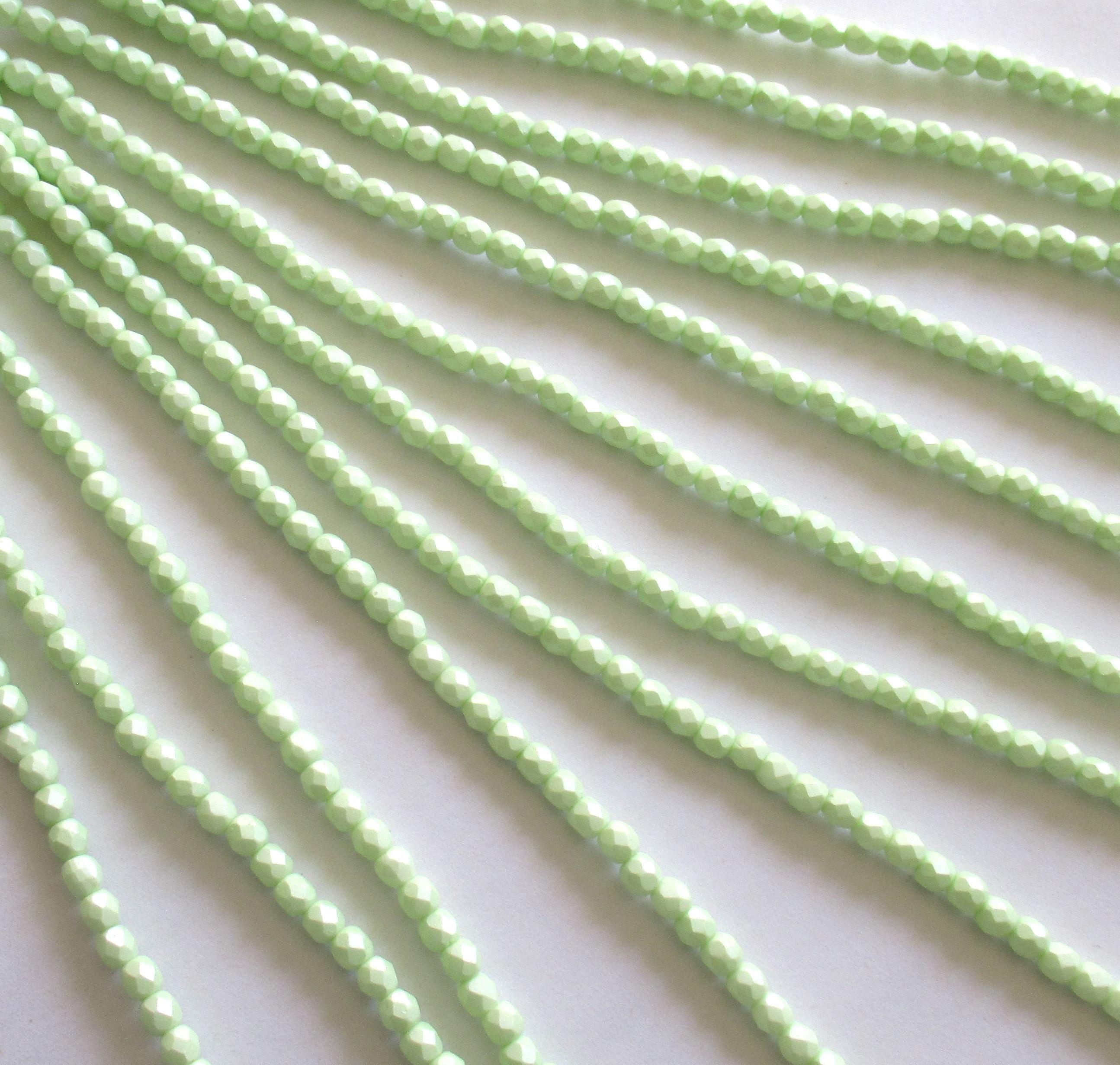 50 4mm Czech glass beads - light powdery pastel lime green - fire polished faceted round beads - C0056 - Glorious Glass Beads