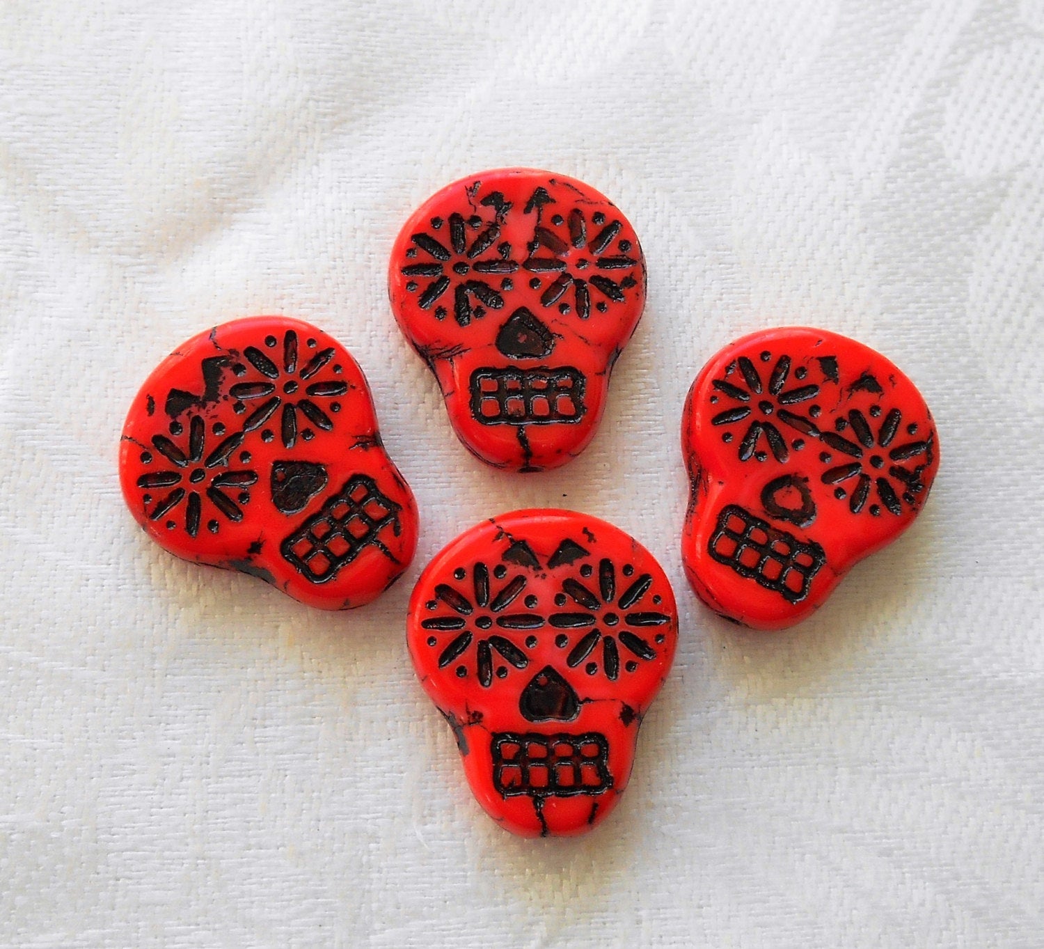 Four large red & black Czech glass skull beads, opaque red glass with black wash, focal beads, 20mm x 17mm C02101