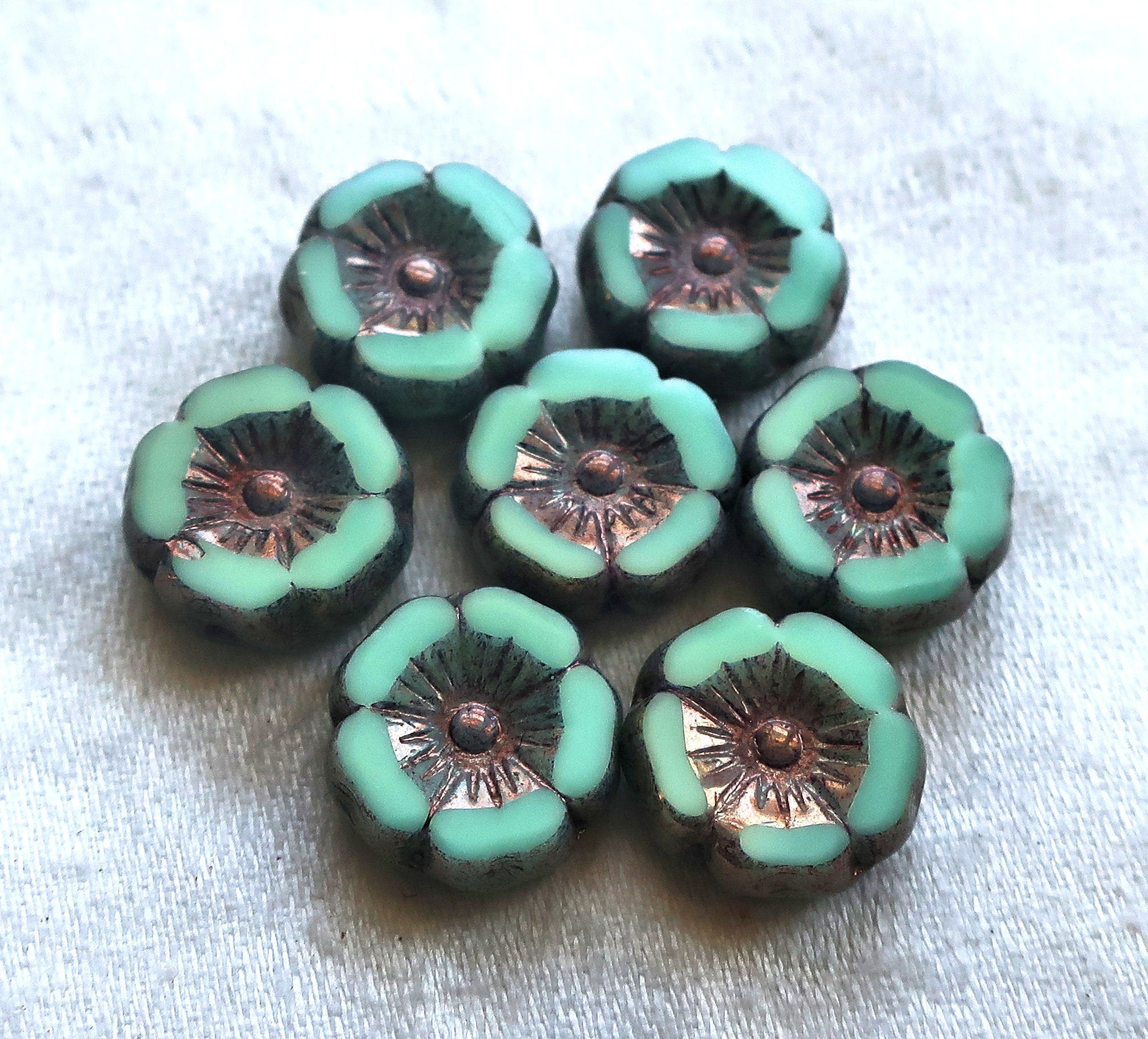 8 Czech glass flower beads - 12mm - mint green w/ a metallic picasso finish - table cut Hawaiian hibiscus floral beads - C05201