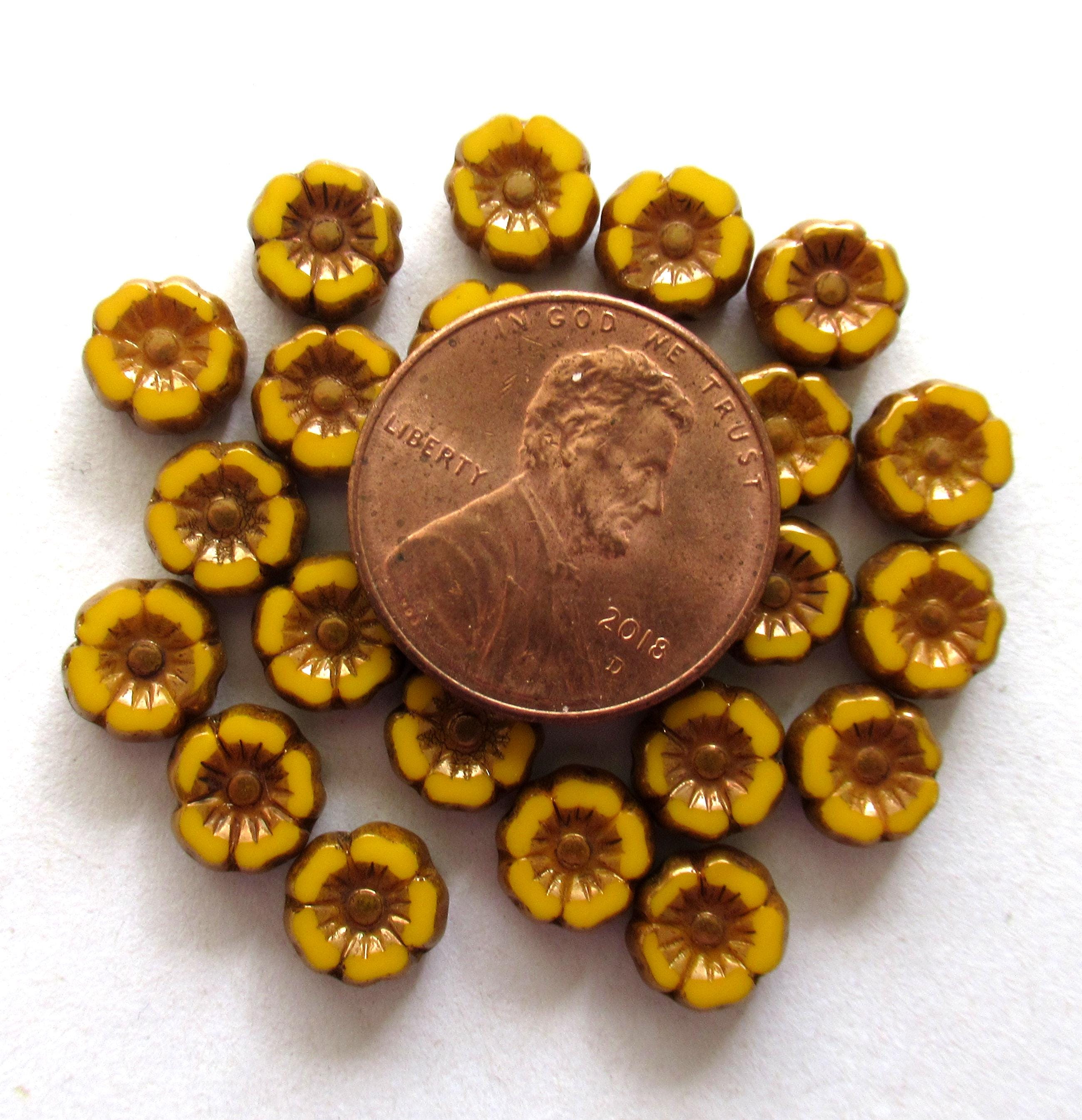 Lot of twelve 7mm Czech glass flower beads - orange yellow with bronze accents - table cut carved hibiscus Hawaiian floral beads - 00061