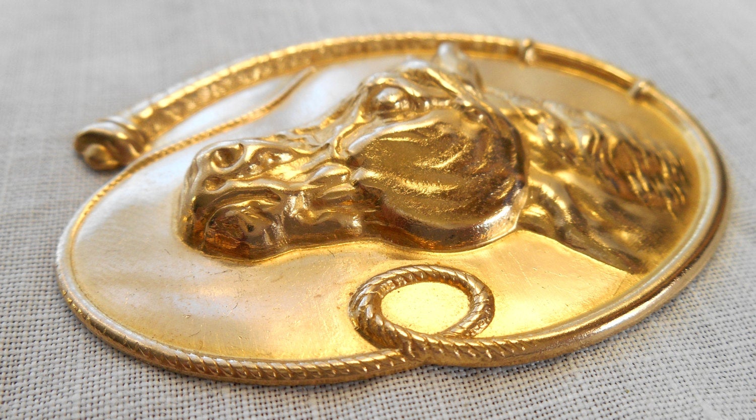 1 large raw brass stamping, a horse's head within a whip, a pendant, charm, connector, ornament, 52mm by 37mm USA made 6501 - Glorious Glass Beads