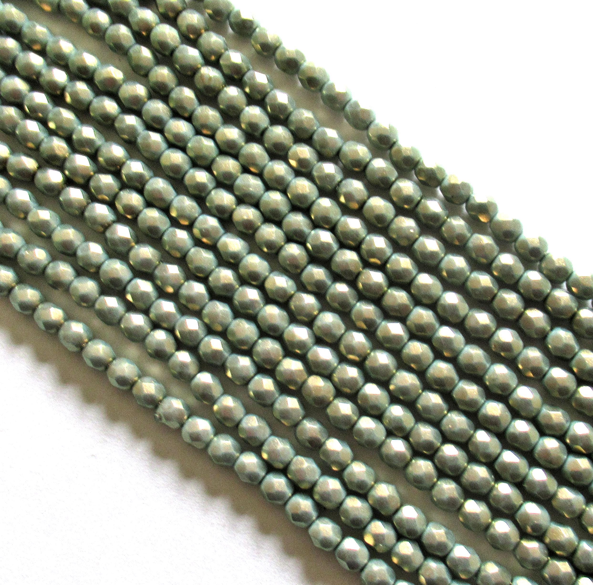 50 4mm Czech glass beads - Halo Ethereal Heavens - light green faceted round beads with a shiny gold finish - C00039