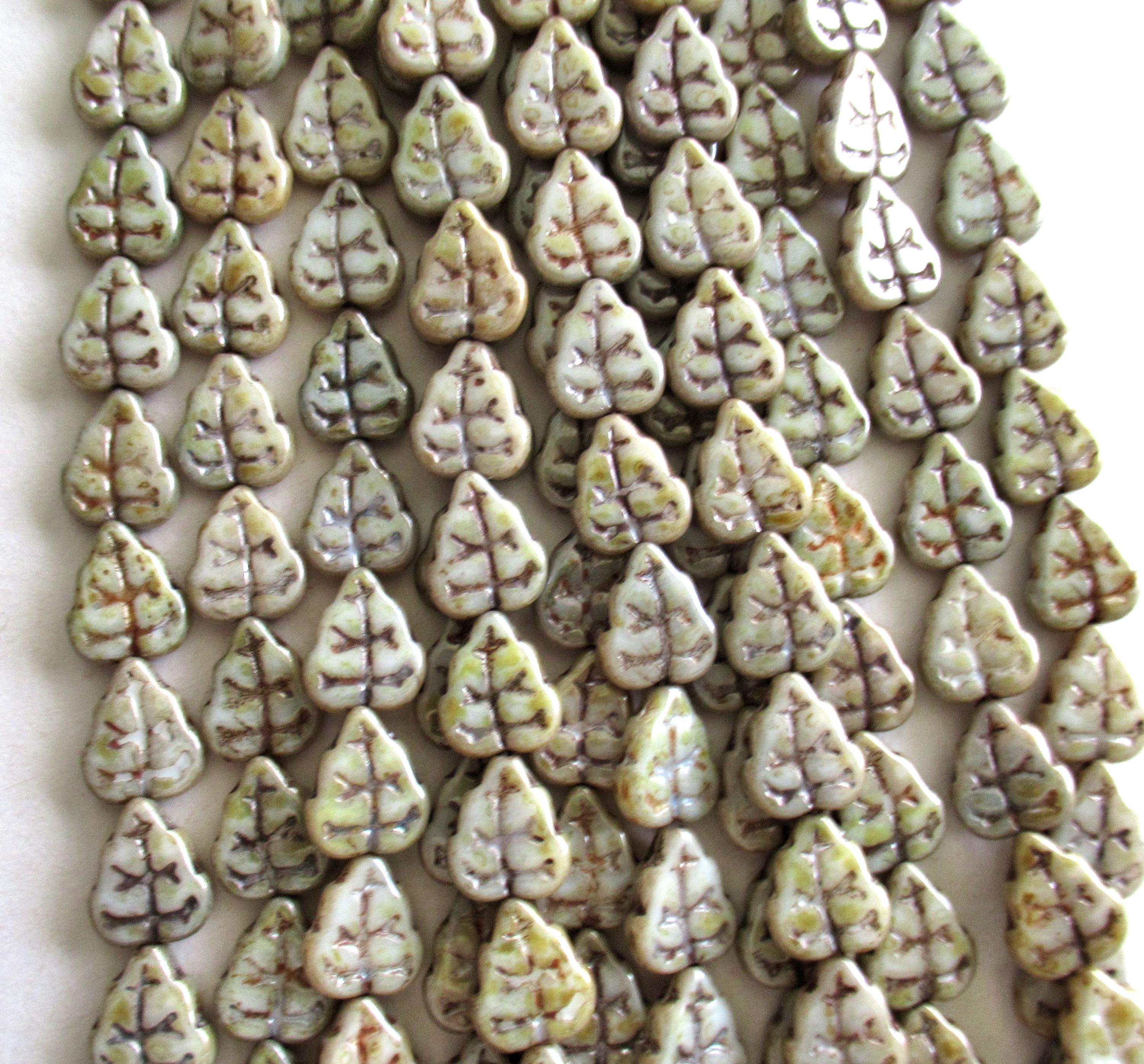 Lot of 25 Czech glass leaf beads - opaque luster green picasso - 8 x 10mm leaves - C0006
