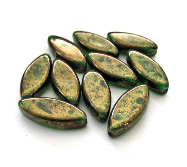 Ten Czech glass spindle beads - transparent emerald green w/ a splotchy bronze finish - 18 x 7mm table cut almond shaped beads C00191