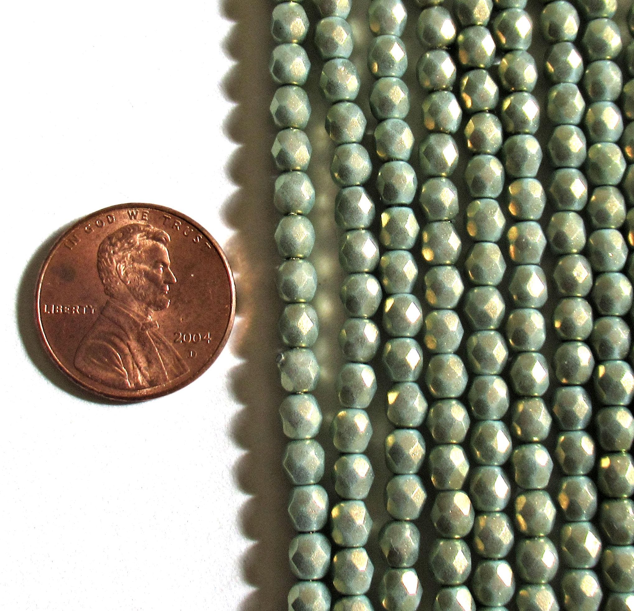 50 4mm Czech glass beads - Halo Ethereal Heavens - light green faceted round beads with a shiny gold finish - C00039