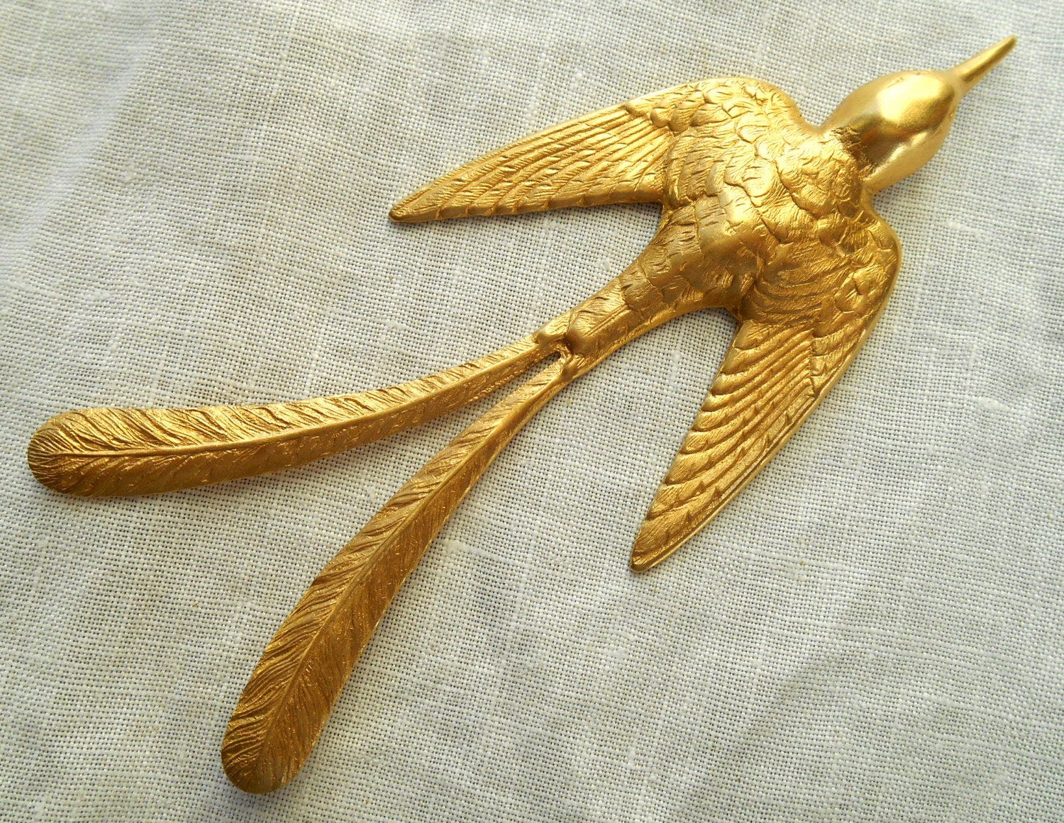 1 large raw brass stamping, art nouveau, elongated flying bird, pendant, charm, ornament, connector 3.5" x 1.37" USA msde C1901 - Glorious Glass Beads