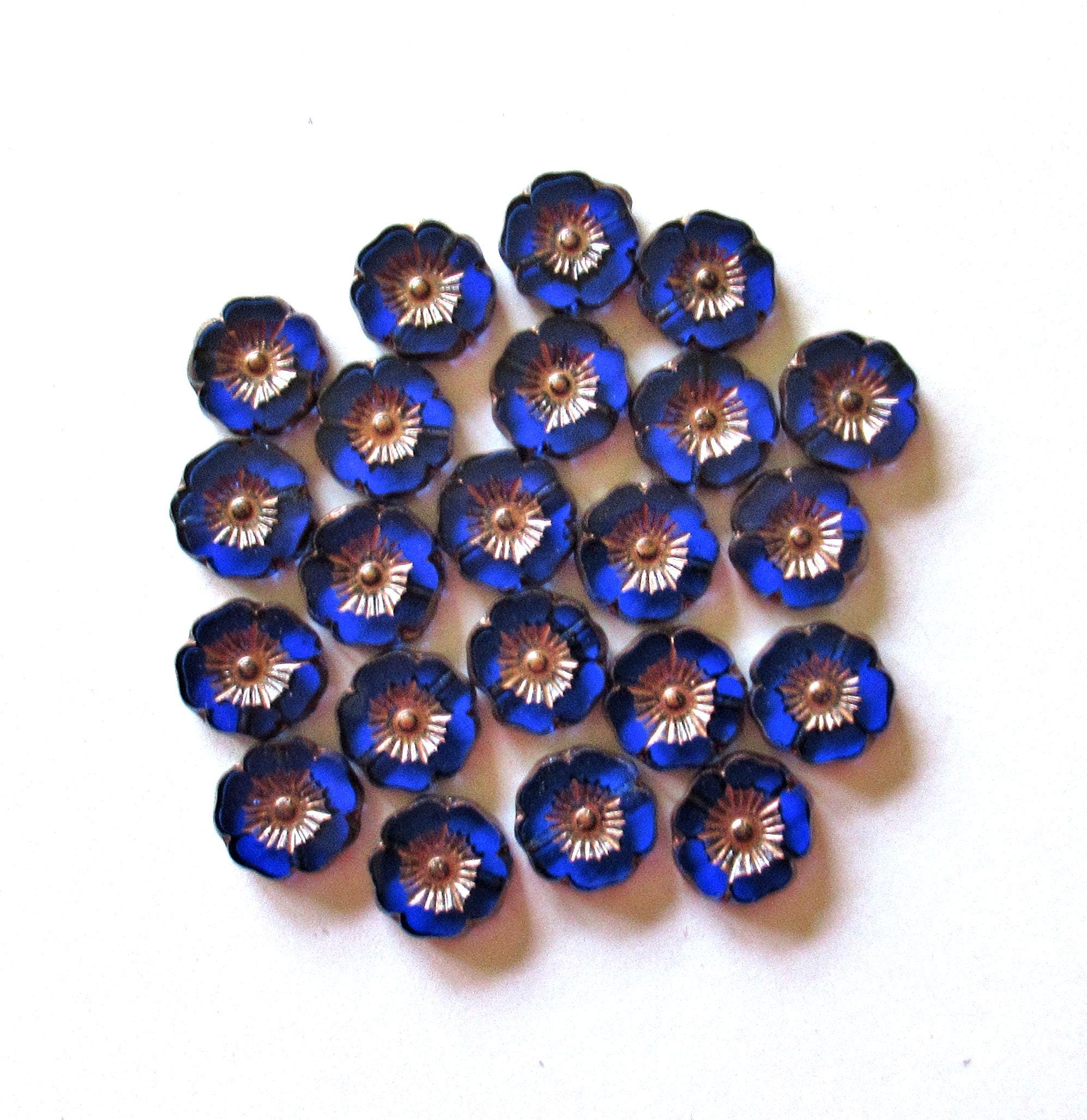 Czech glass flower beads - 12mm - sapphire blue w/ copper accents - table cut carved - Hawaiian hibiscus flowers - 8 beads - C0741
