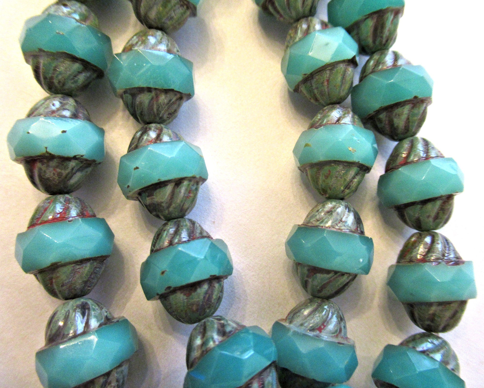 Ten Czech glass turbine beads - 11 x 10mm light translucent milky blue green faceted saucer beads with a Picasso finish C00681