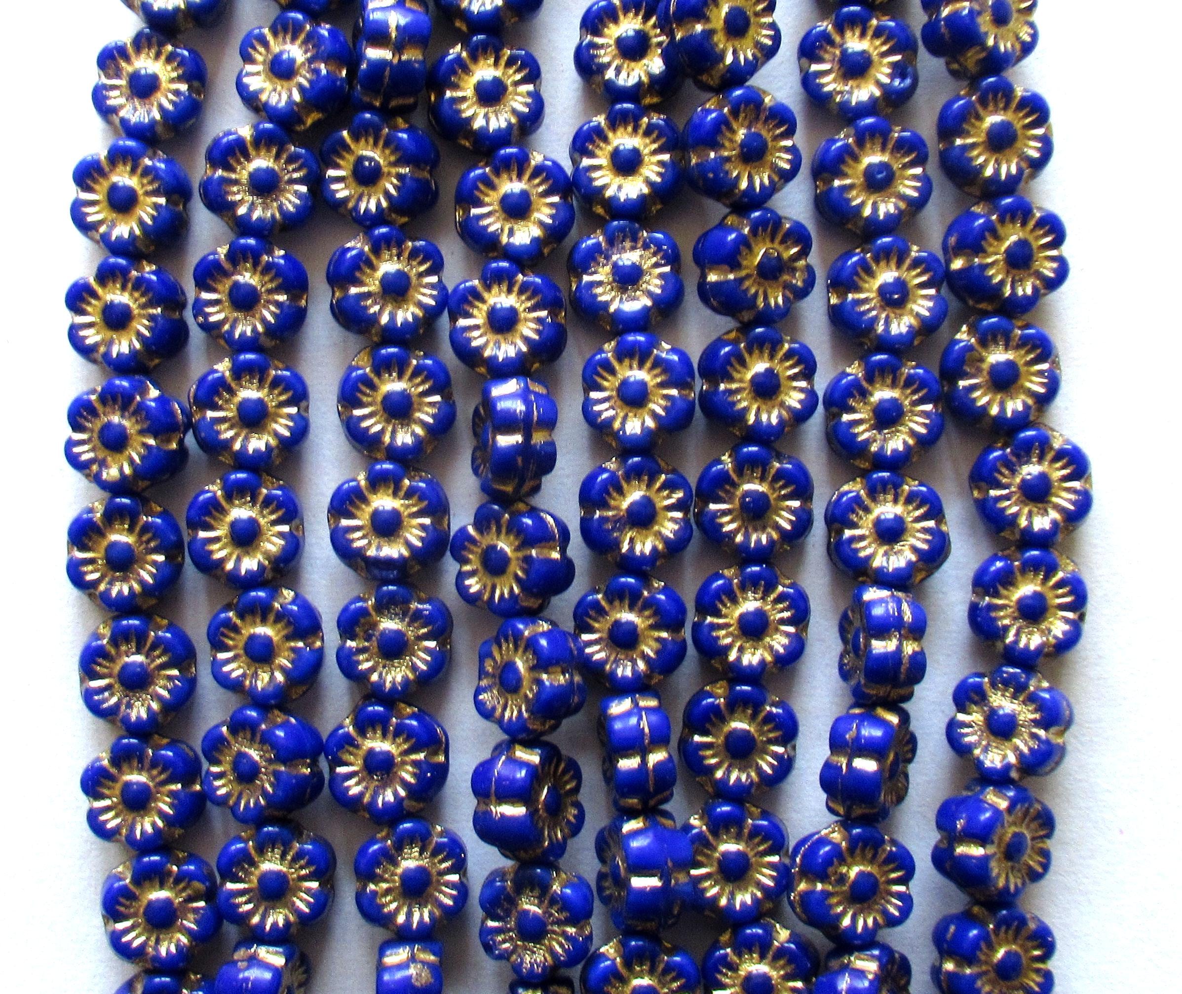 25 small Czech glass flower beads - 6mm - opaque royal blue beads with a gold wash - C0088