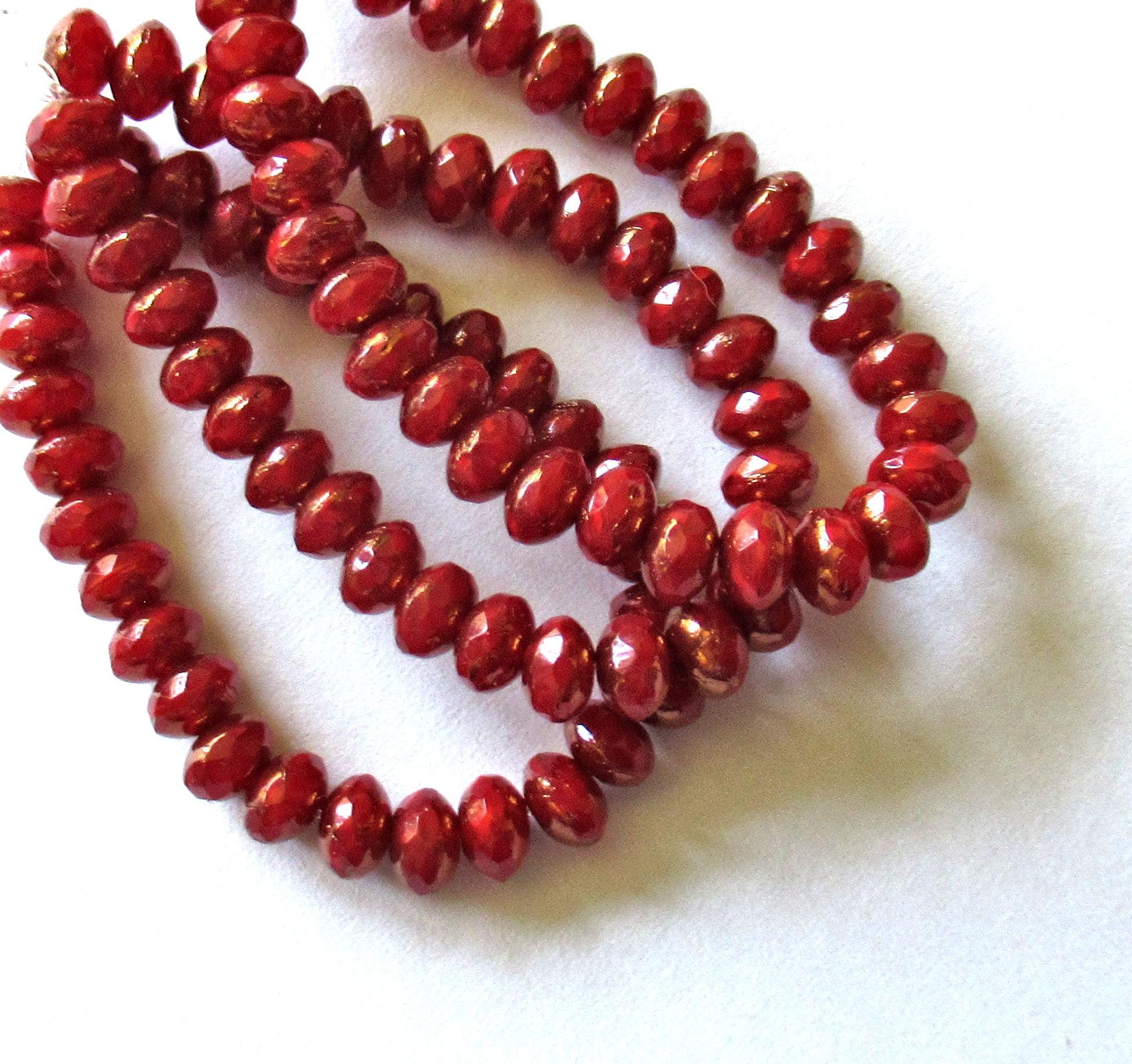 30 small Czech glass puffy rondelle beads - 3mm x 5mm - deep red with bronze accents - faceted fire polished - 00041
