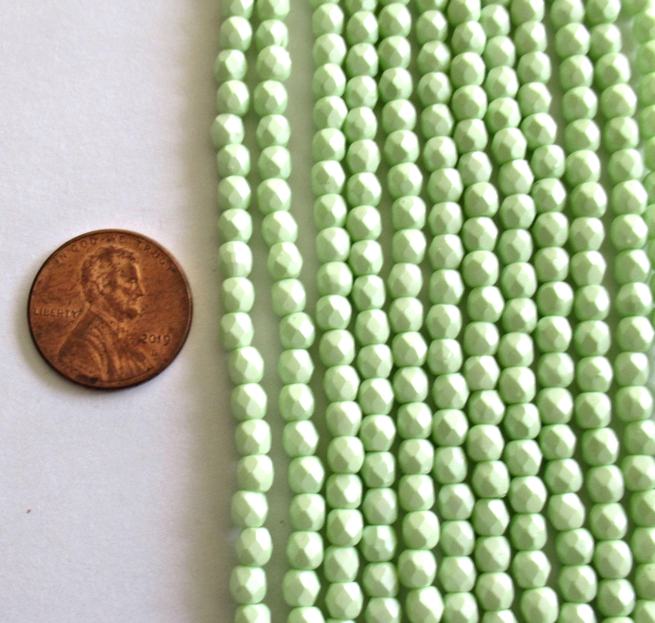 50 4mm Czech glass beads - light powdery pastel lime green - fire polished faceted round beads - C0056 - Glorious Glass Beads