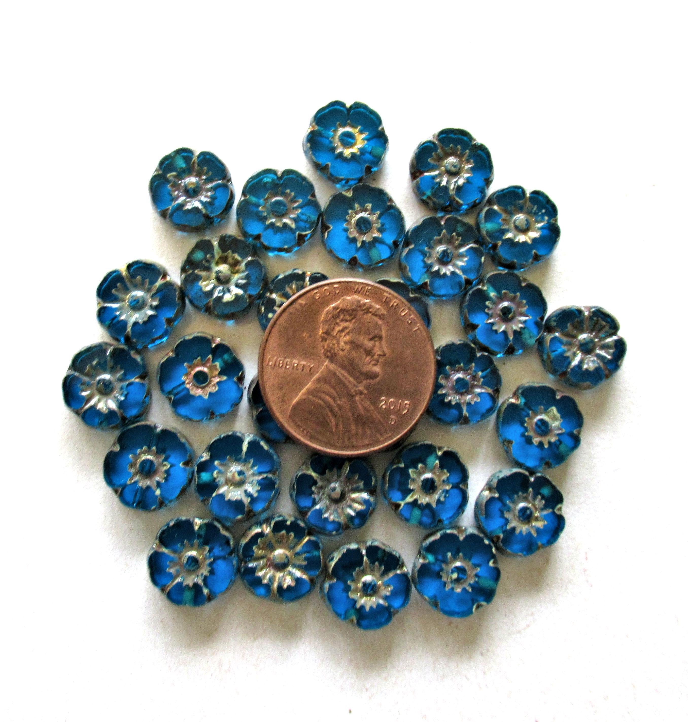 Ten Czech glass flower beads - 10mm - transparent capri blue picasso Hawaiian hibiscus flowers - table cut carved floral - C00101